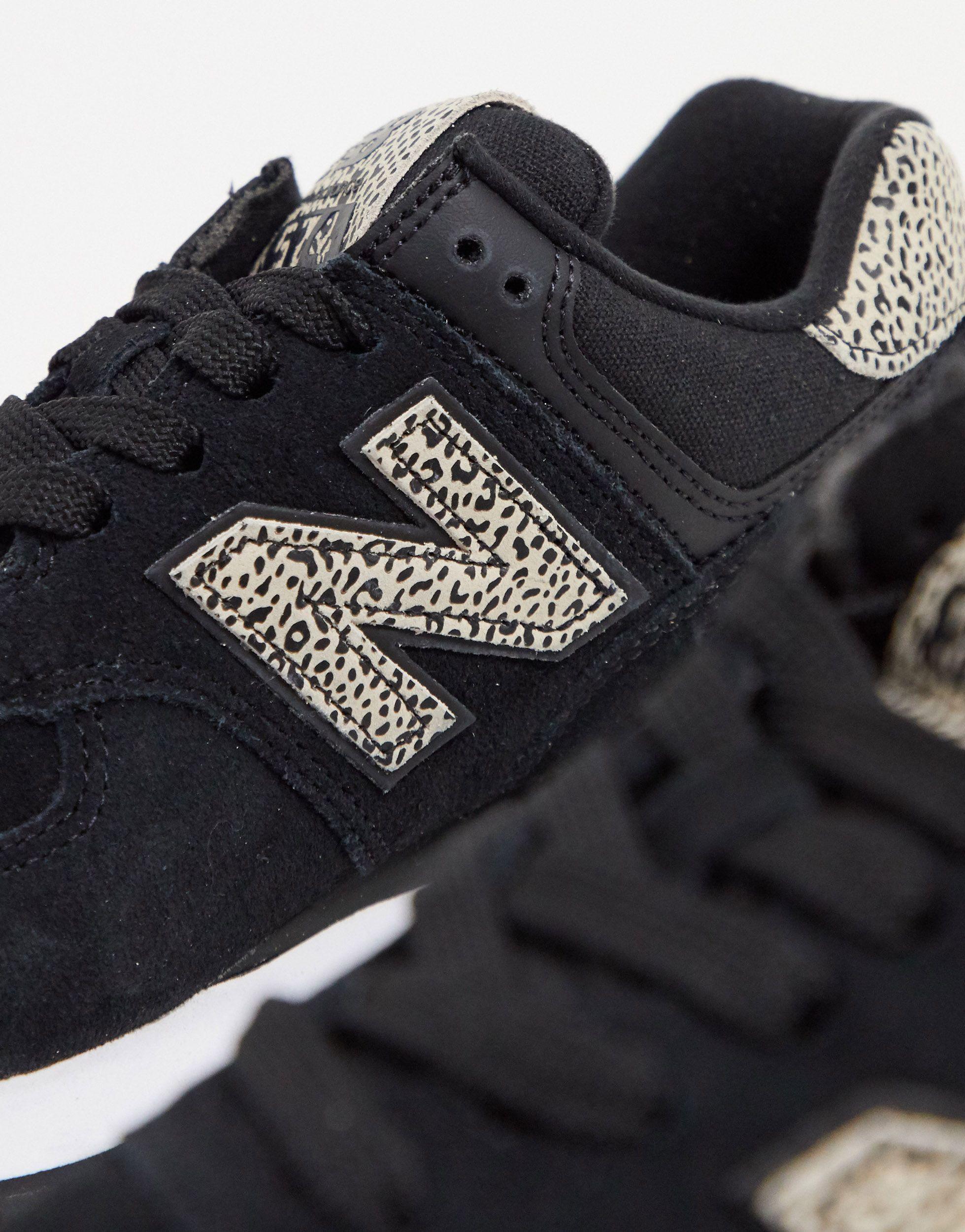 leopard print and black trainers