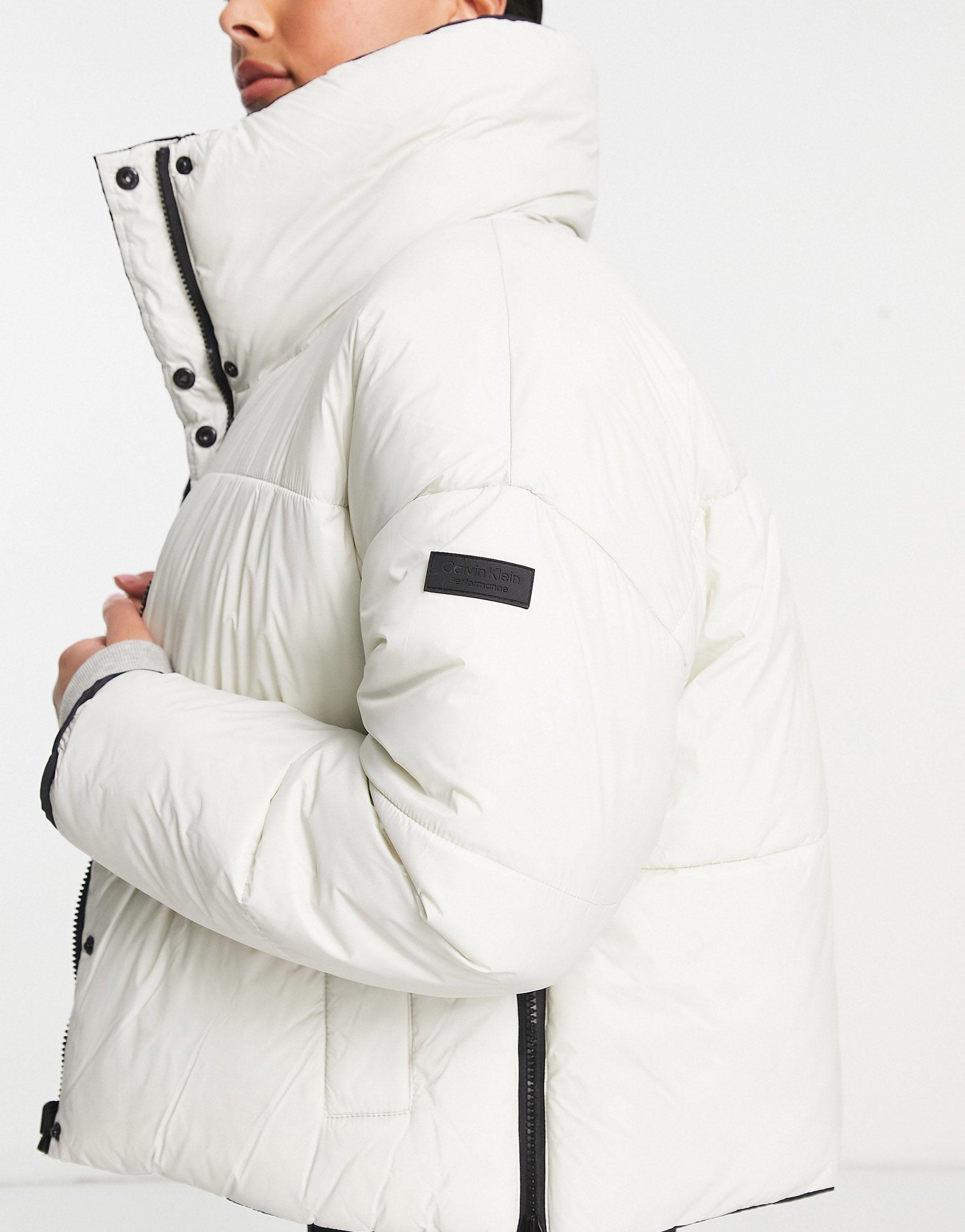 metro flexibel Moet Calvin Klein Reversible Oversized Puffer Coat in Natural | Lyst