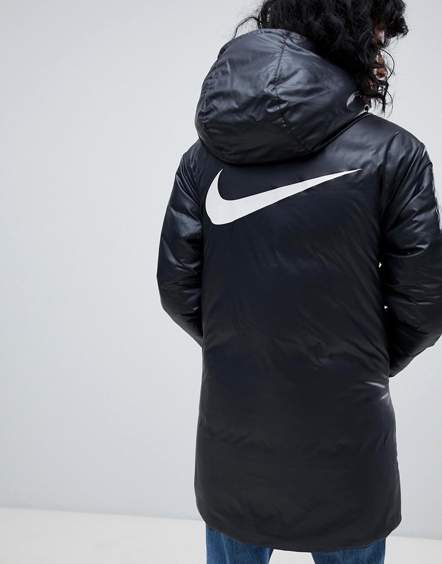 Nike Lang geschnittene, wattierte Jacke mit Logo in Schwarz Small in  Schwarz | Lyst DE