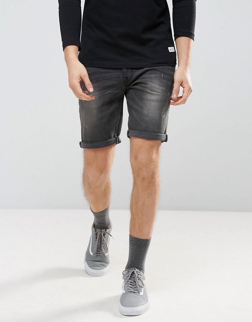 washed black denim shorts