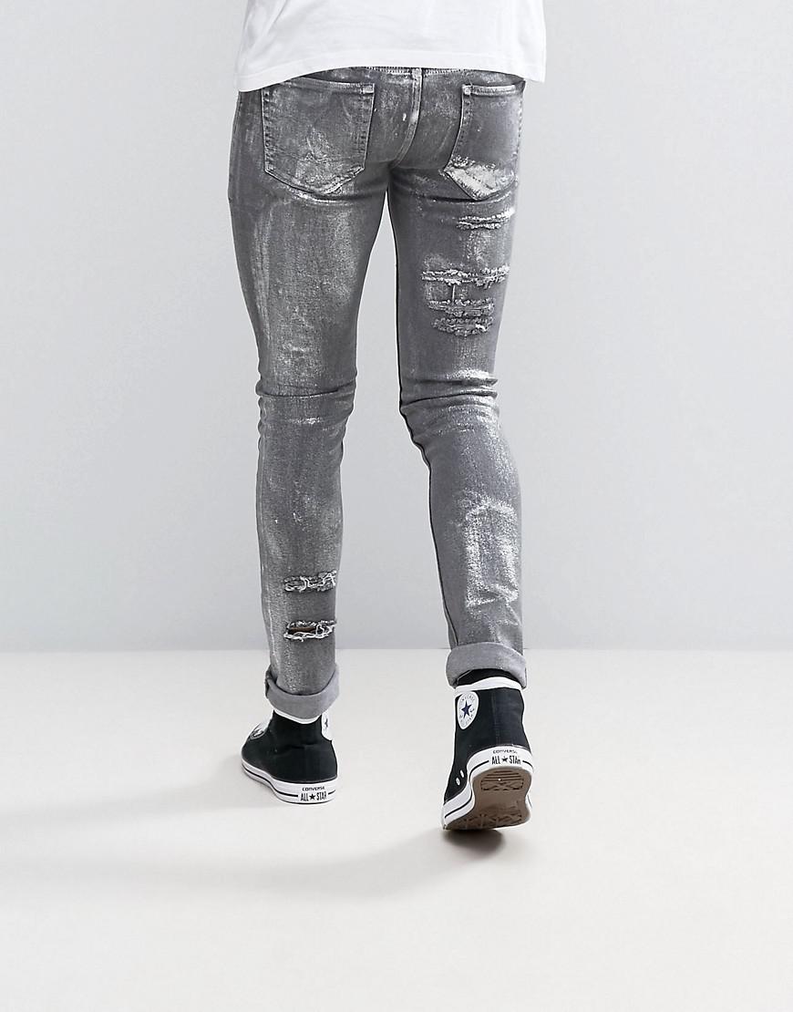 ASOS Denim Super Skinny Jeans With Rips In Metalic Sliver Coated Washed