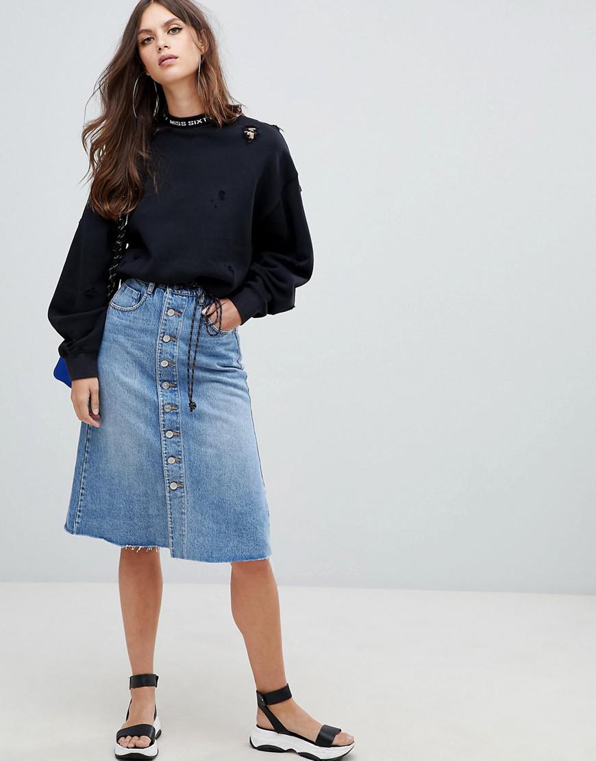 button through denim skirt