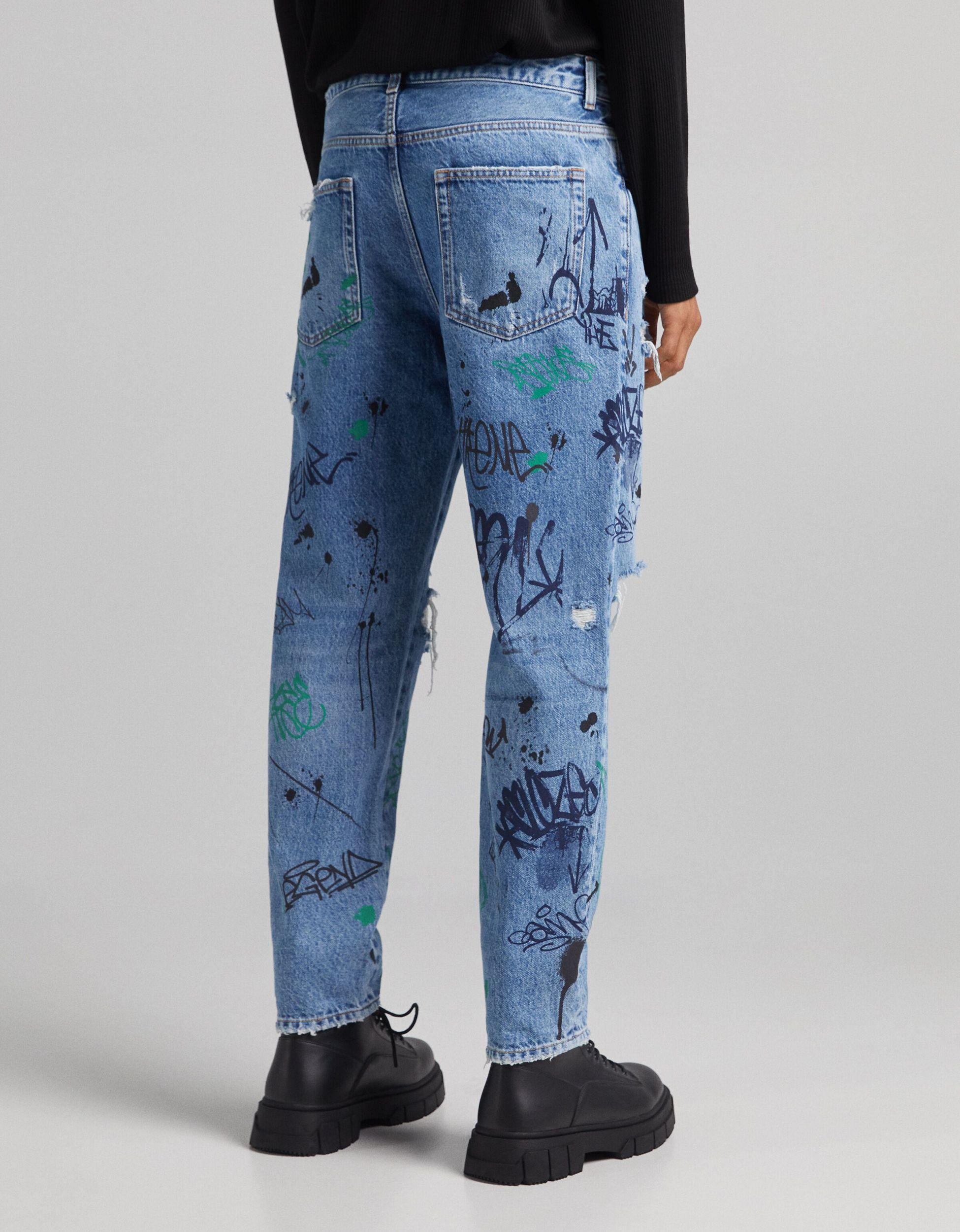 Jean droit déchiré à imprimé graffiti Bershka pour homme en coloris Bleu |  Lyst