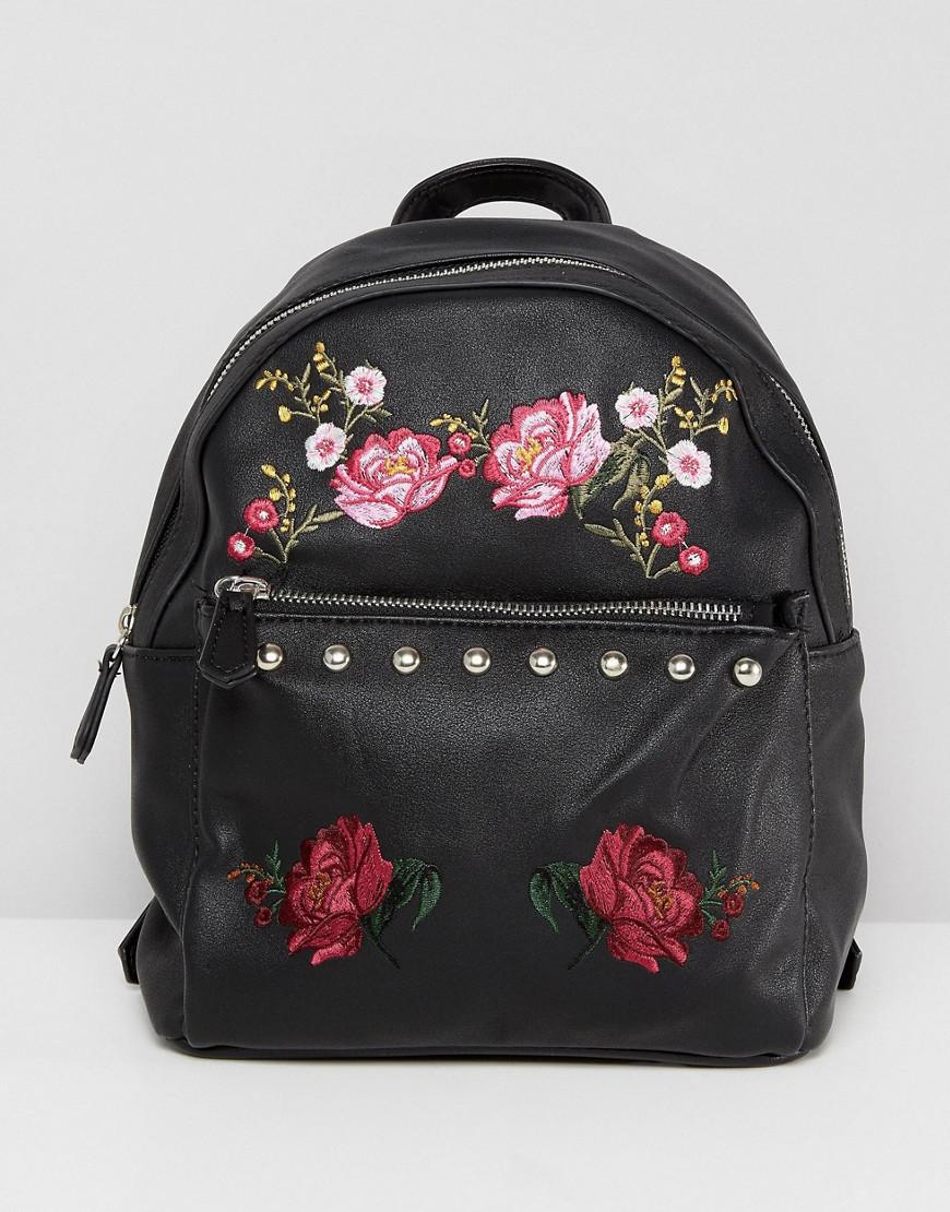 black embroidered backpack