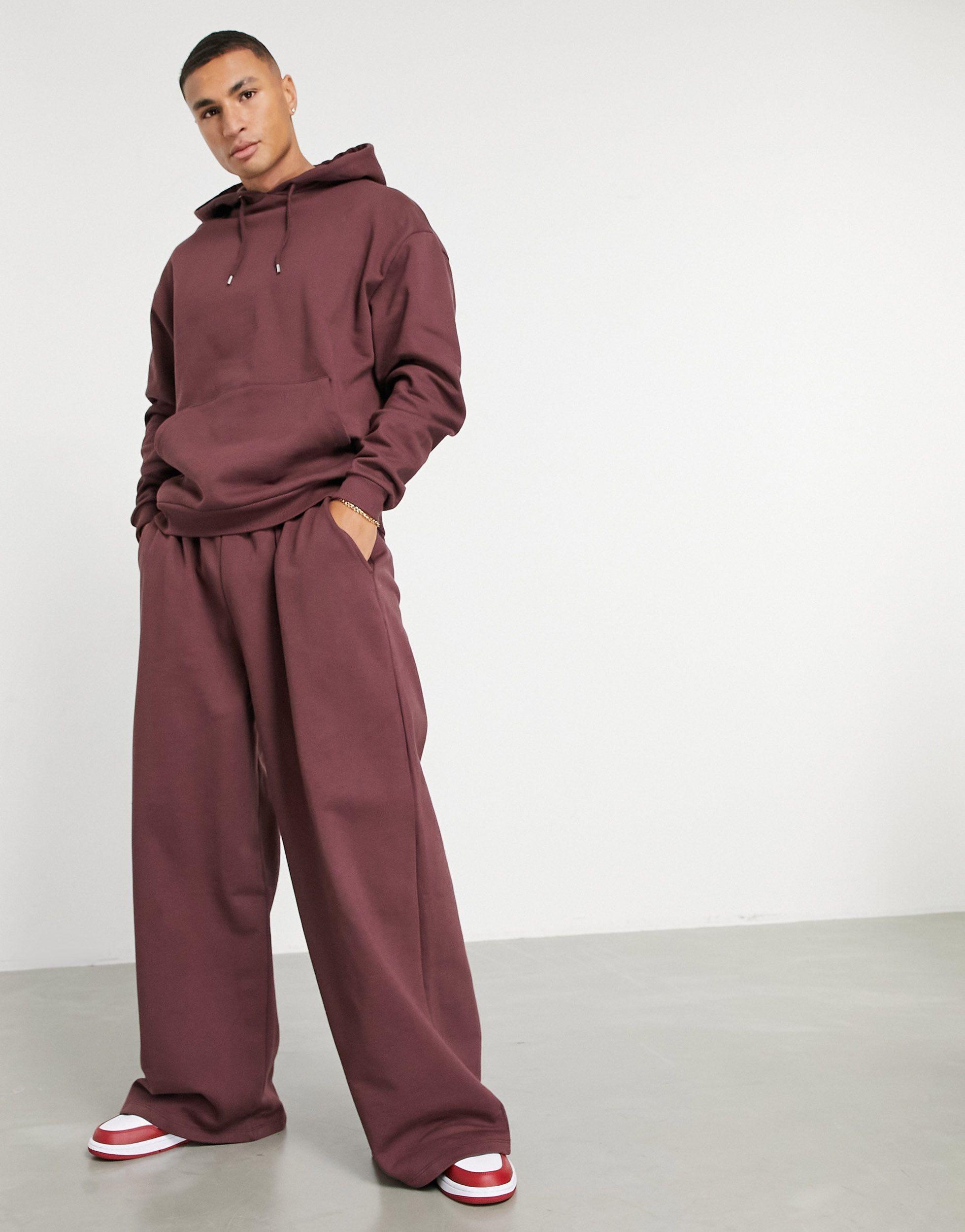 Tuta sportiva oversize bordeaux con felpa con cappuccio e joggers a fondo  ampio da Uomo di ASOS in Rosso | Lyst