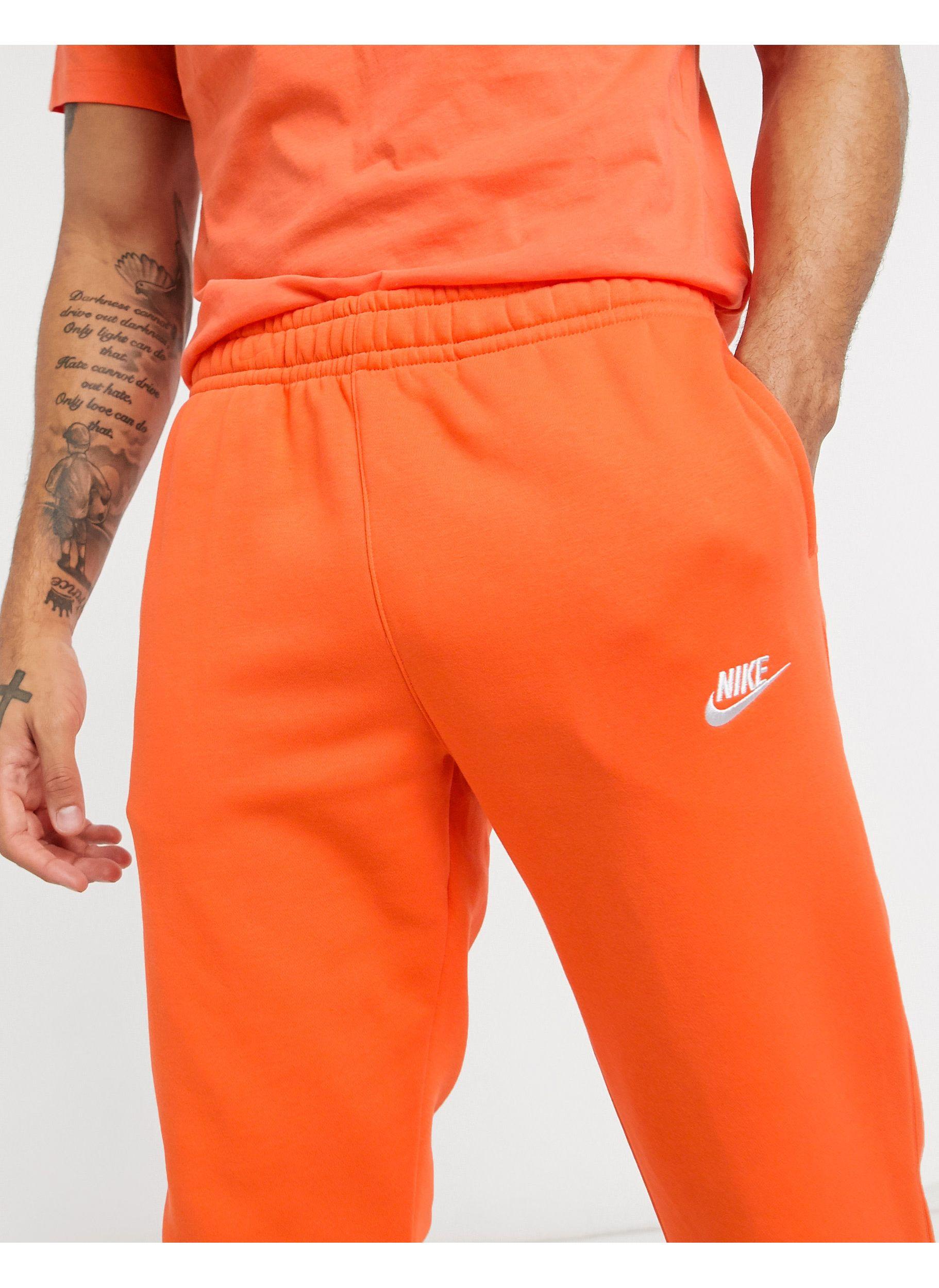 nike orange joggers