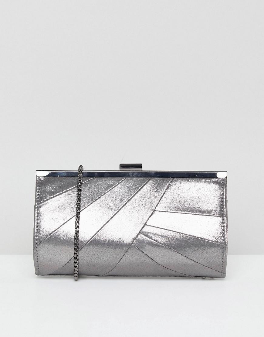 white and silver clutch bag