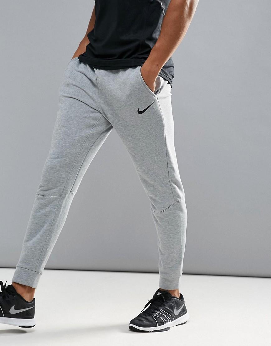Nike grey tapered joggers sale