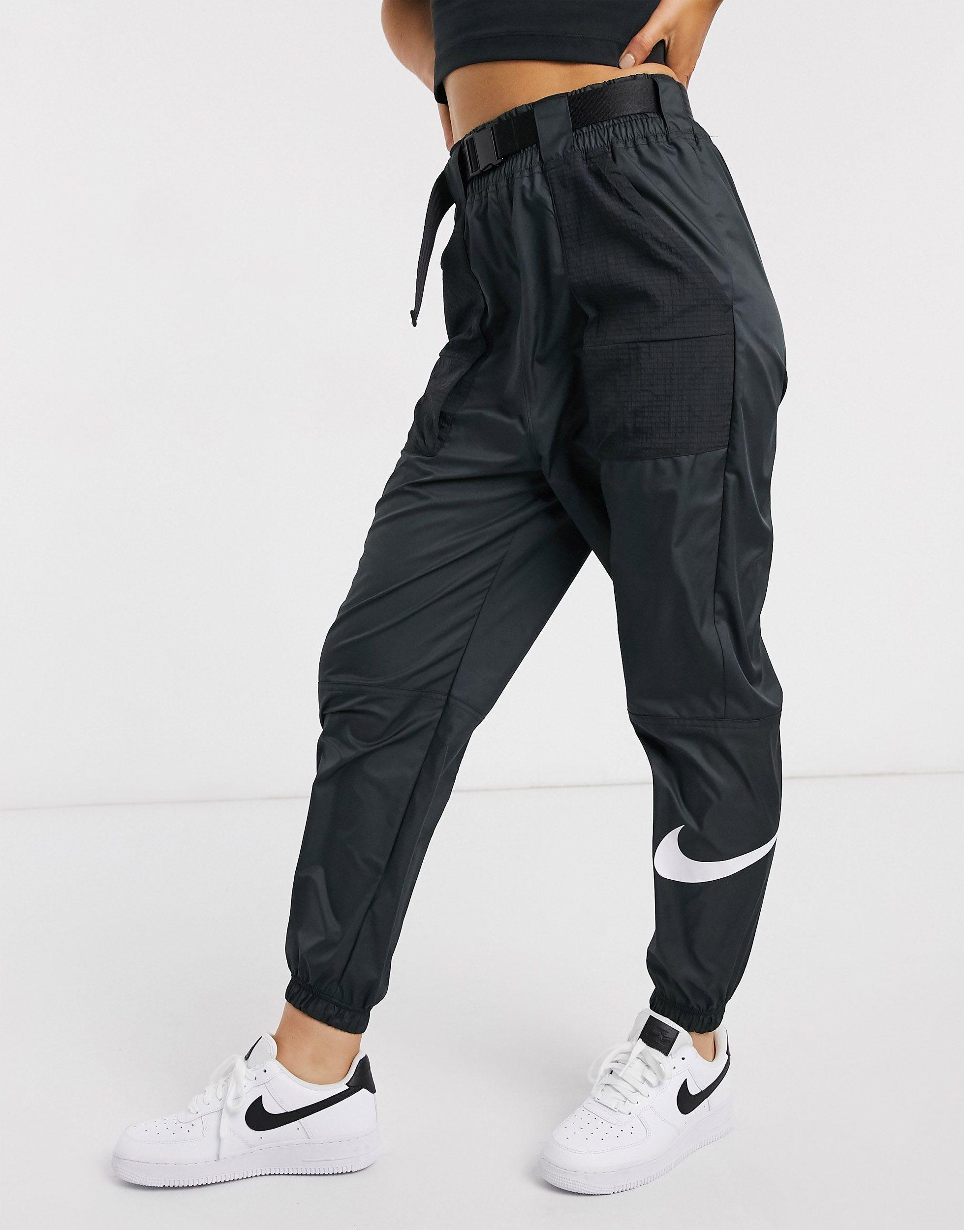 Pantalon cargo tissé avec logo virgule et ceinture Nike en coloris Noir -  Lyst