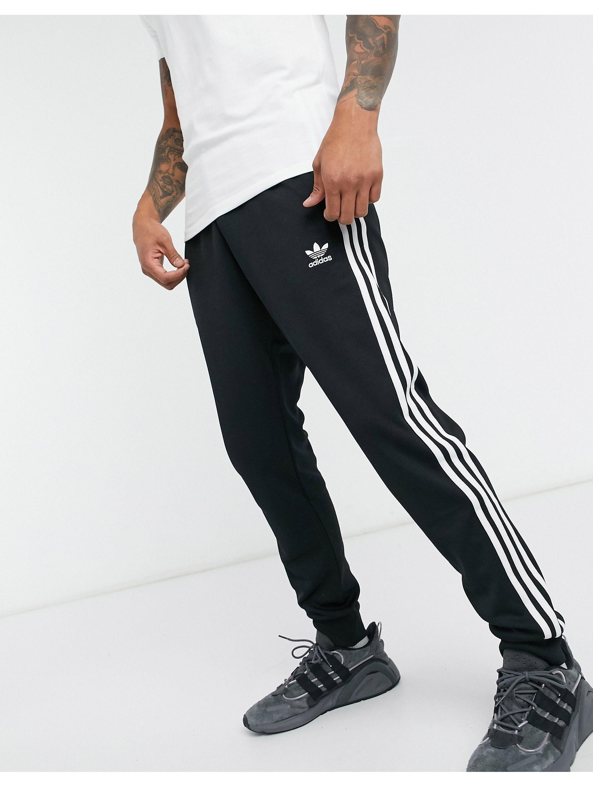 Adicolor - Jogger coupe skinny à trois bandes adidas Originals pour homme en  coloris Noir - 5 % de réduction - Lyst