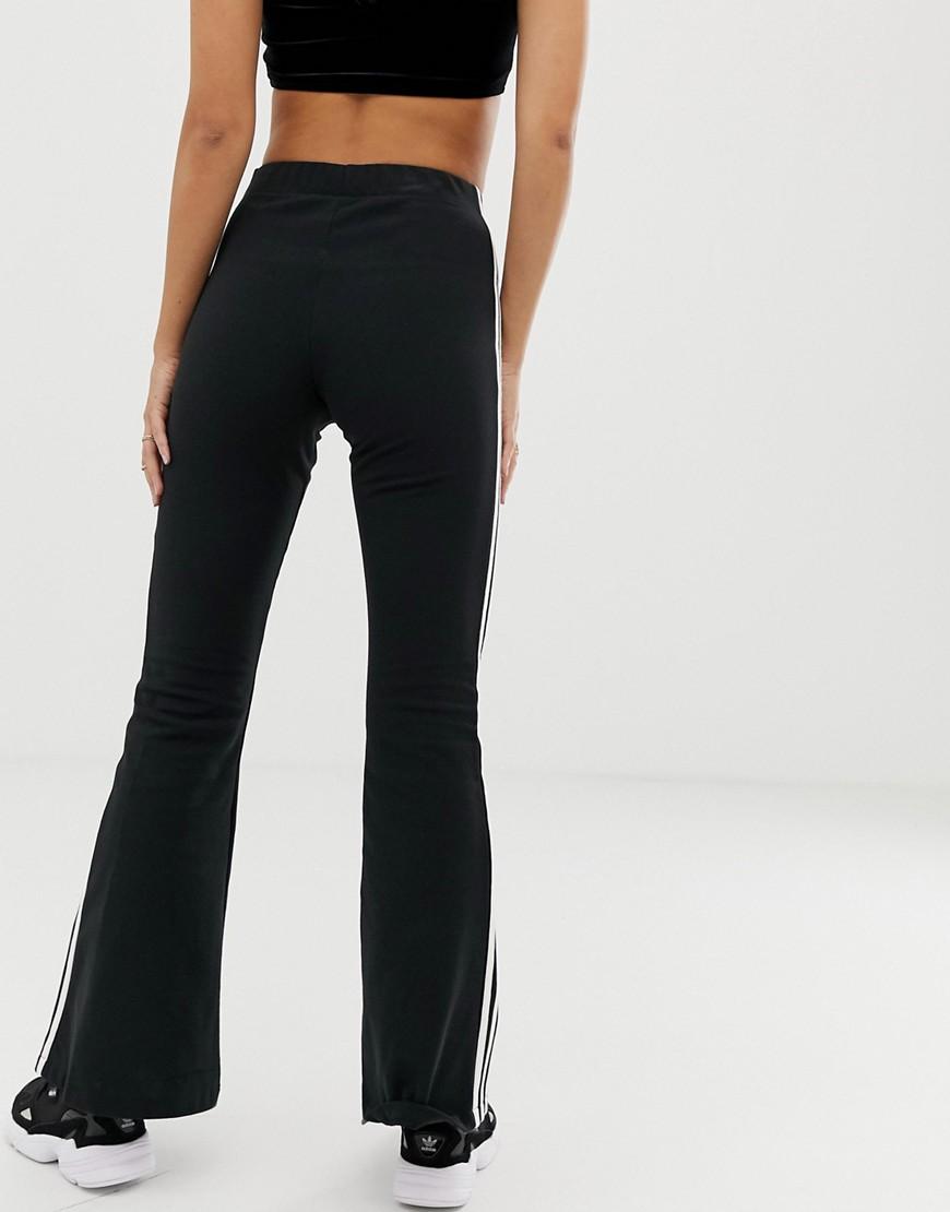 adidas Originals Cotton Adicolor Three Stripe Flared Pants in Black | Lyst