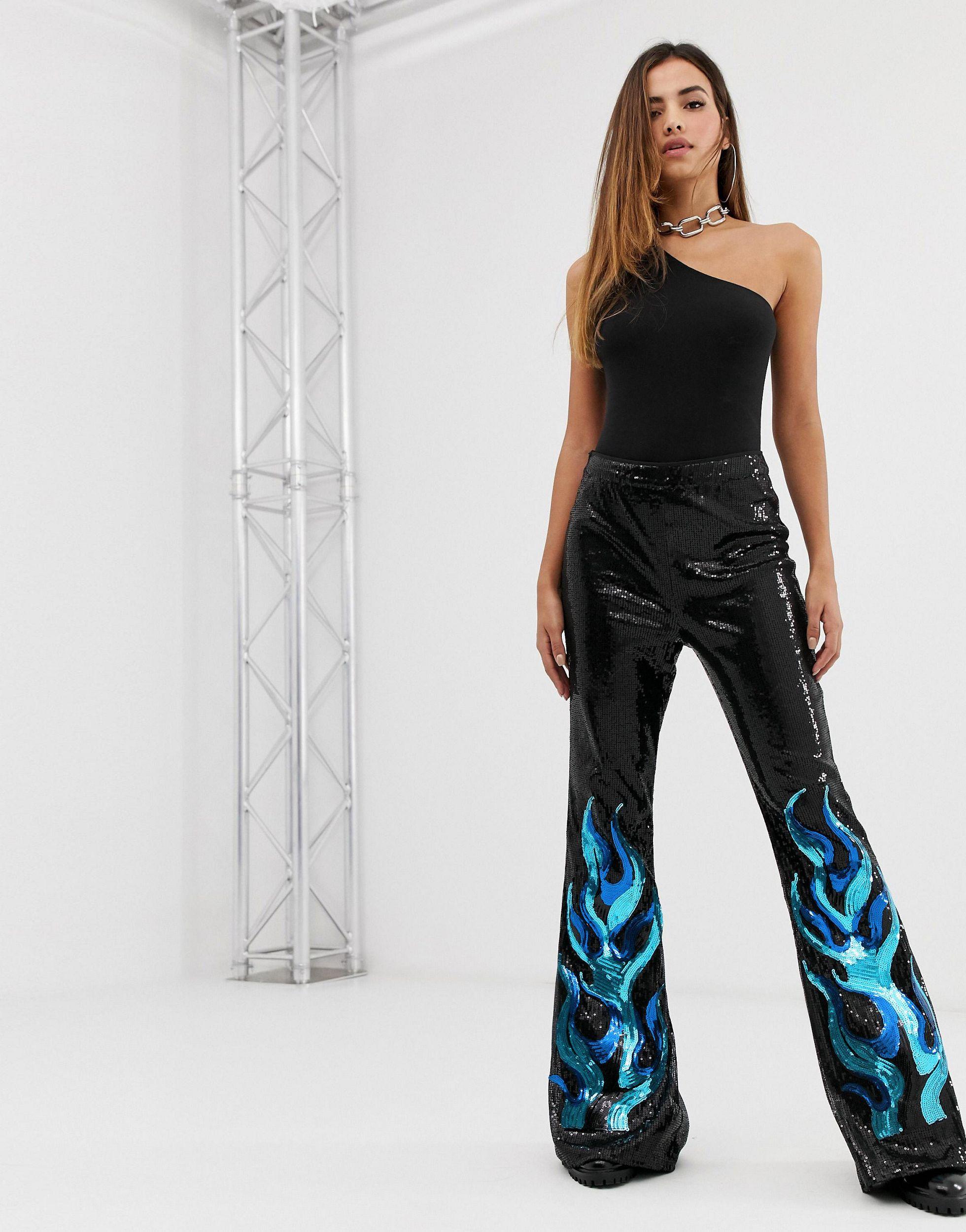 PrettyLittleThing Synthetic Festival Flare Trousers With Flame Details in  Black - Lyst