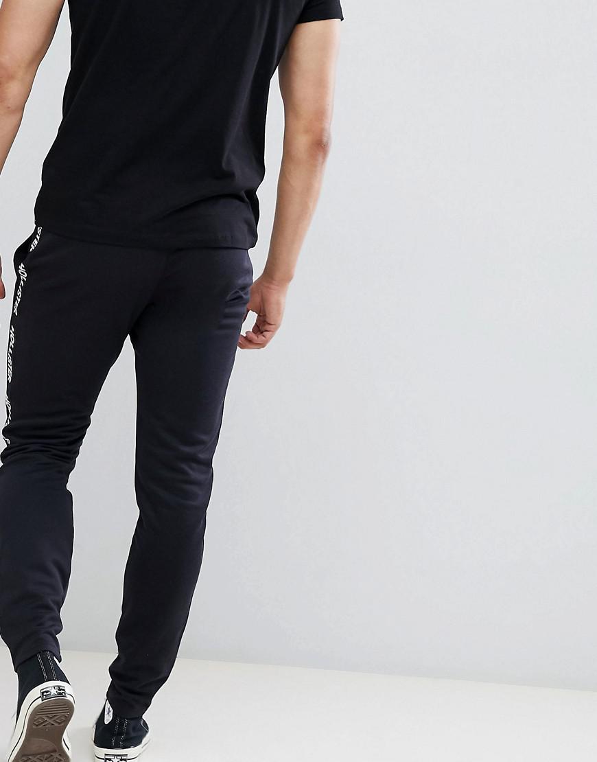 Hollister Cotton Logo Side Tape Track Pants In Black for Men | Lyst