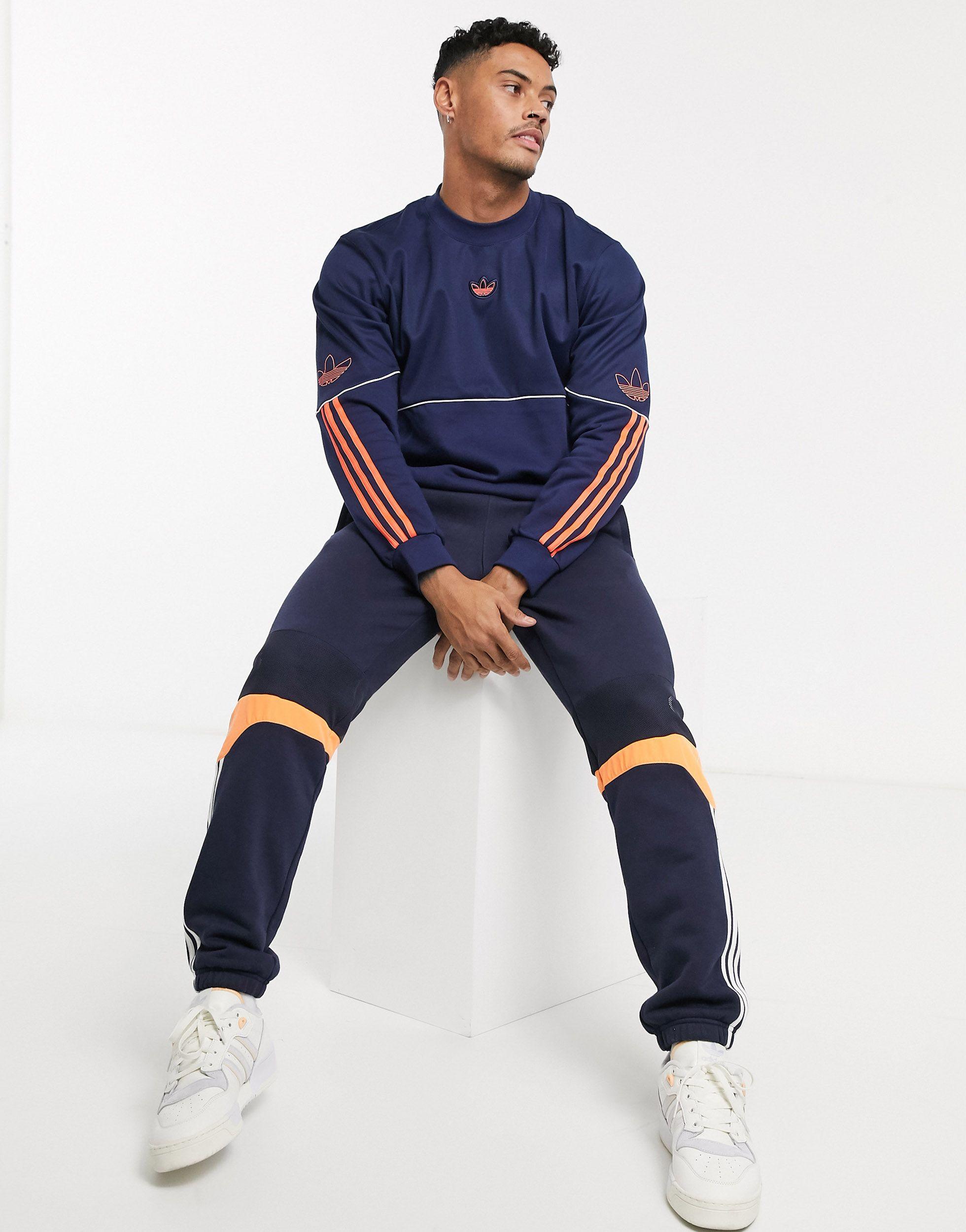 adidas originals hoodie with central trefoil and band logo in navy