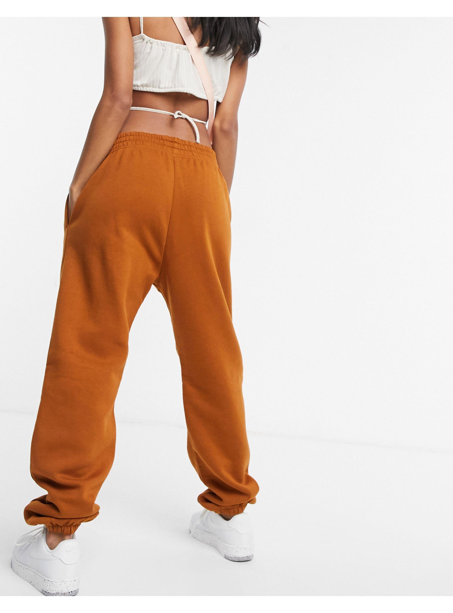 nike mini swoosh oversized trackies