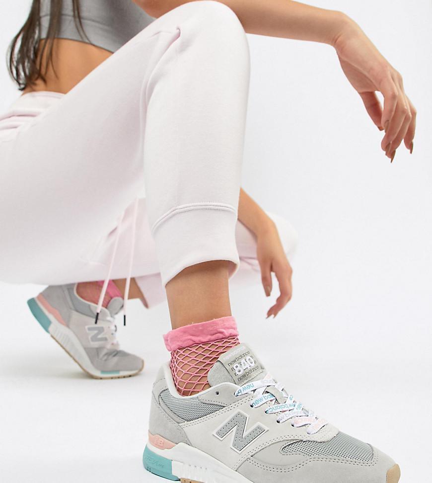 new balance 840 white and silver trainers