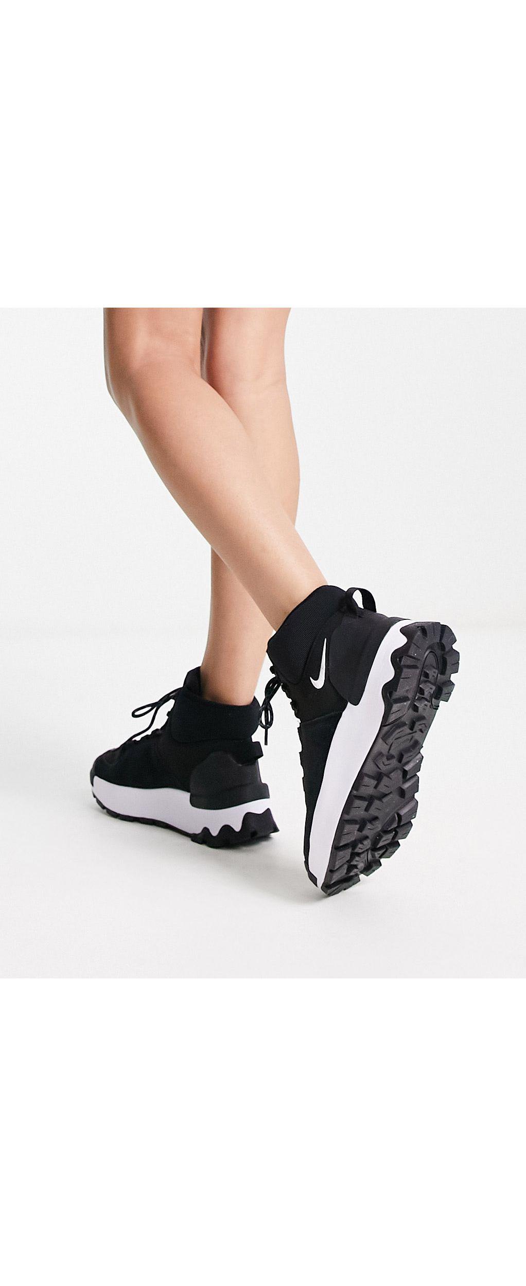 Botas nike blancas y negras cheap
