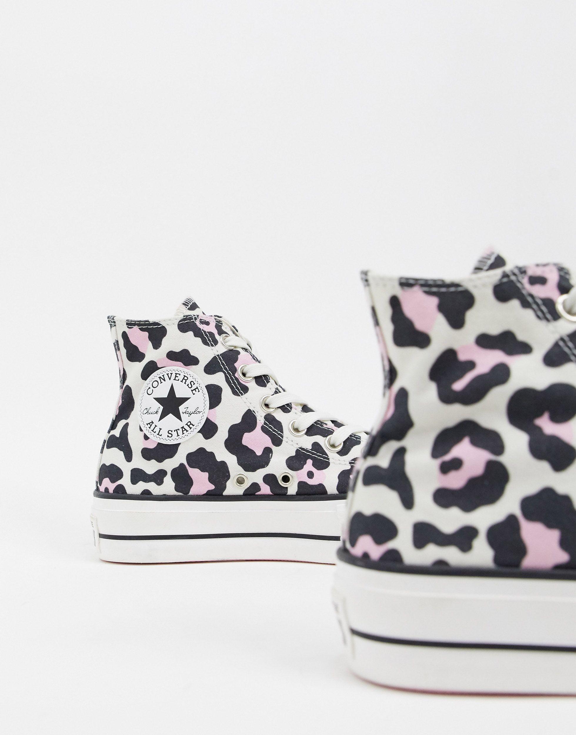 Converse leopard top print trainers