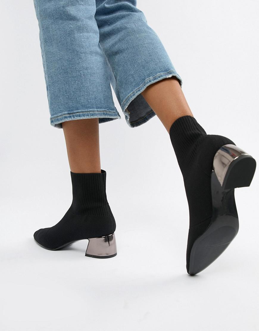 black metallic boots