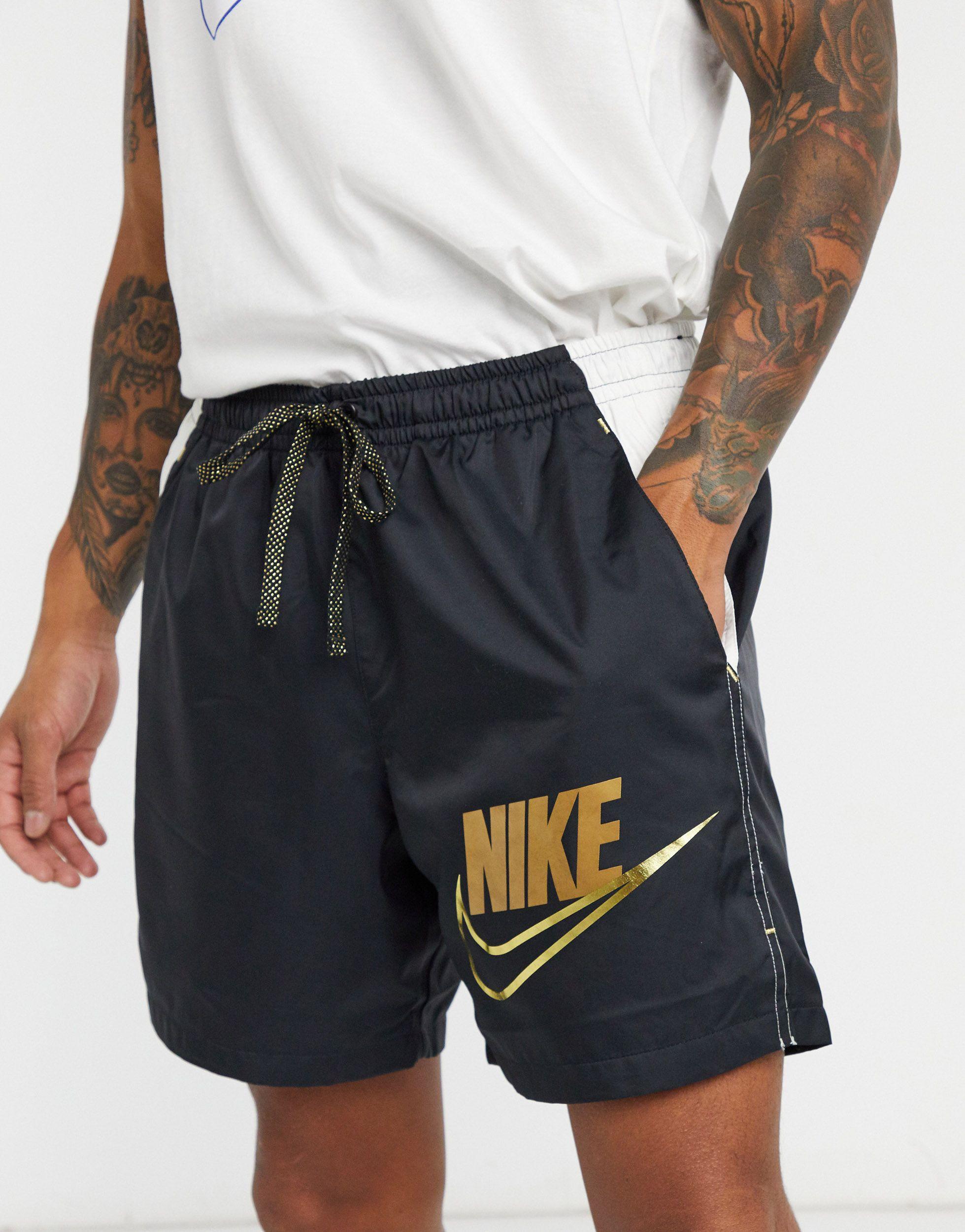 Nike Synthetic Metallic Woven Flow Shorts in Black/Gold (Black) for Men |  Lyst