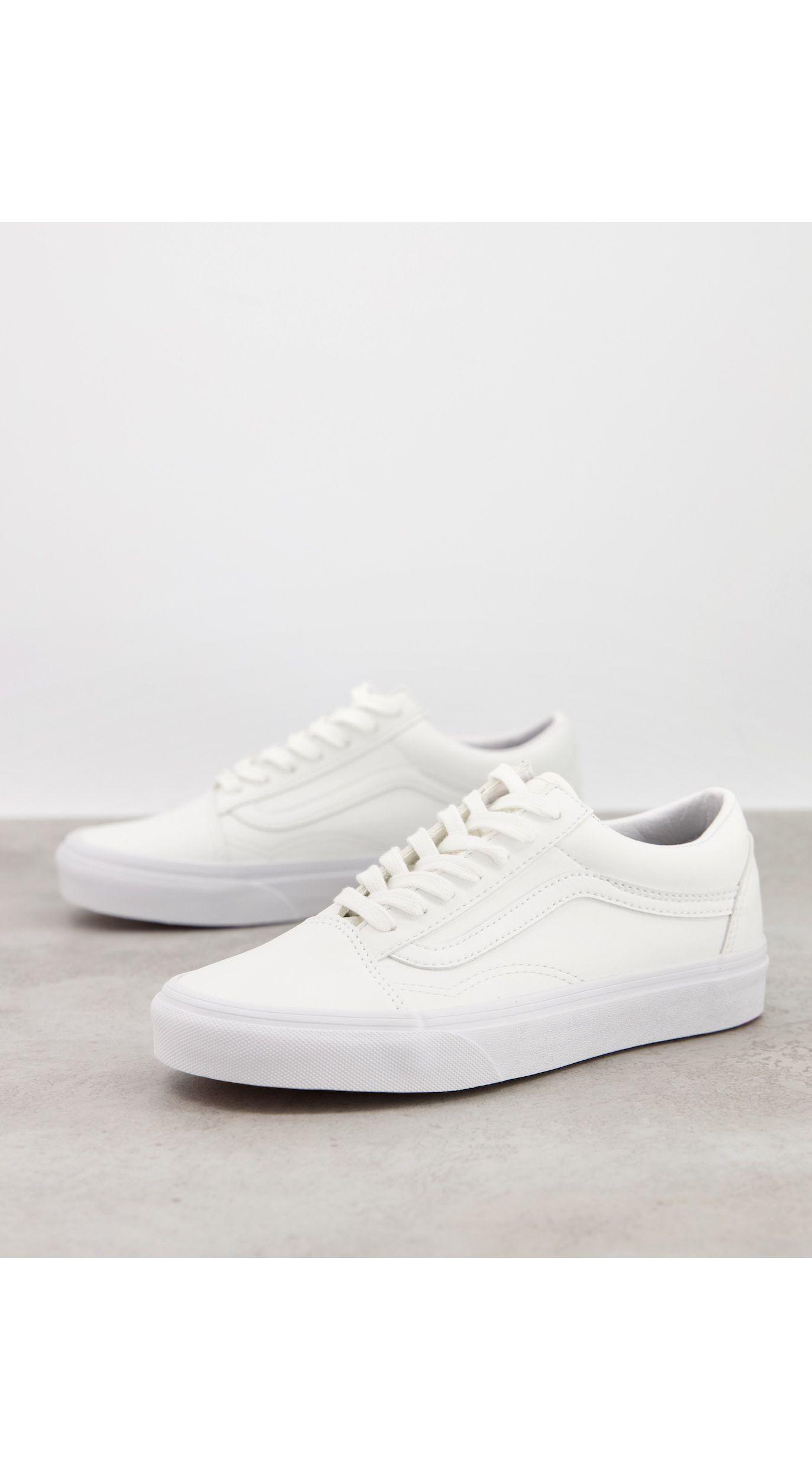 white faux leather vans