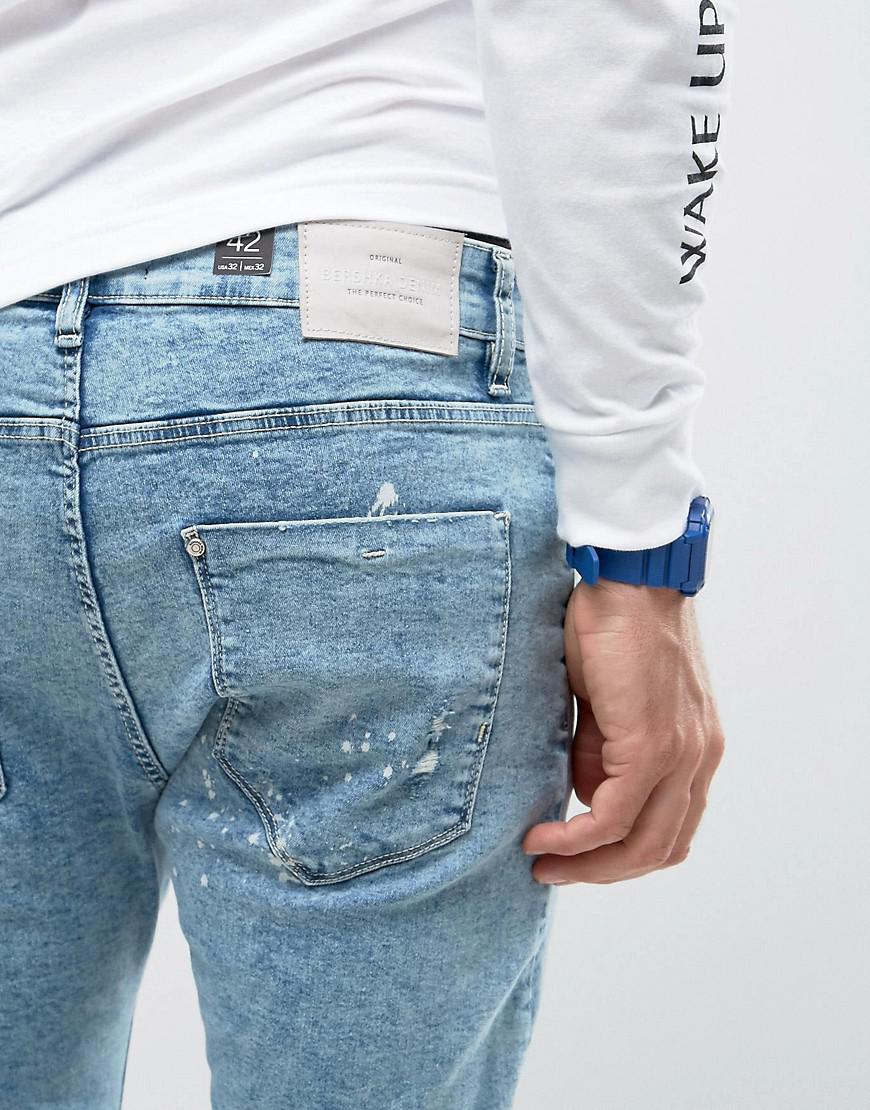 Lyst Bershka Super Skinny Jeans With Knee Rips In Bleached Blue in