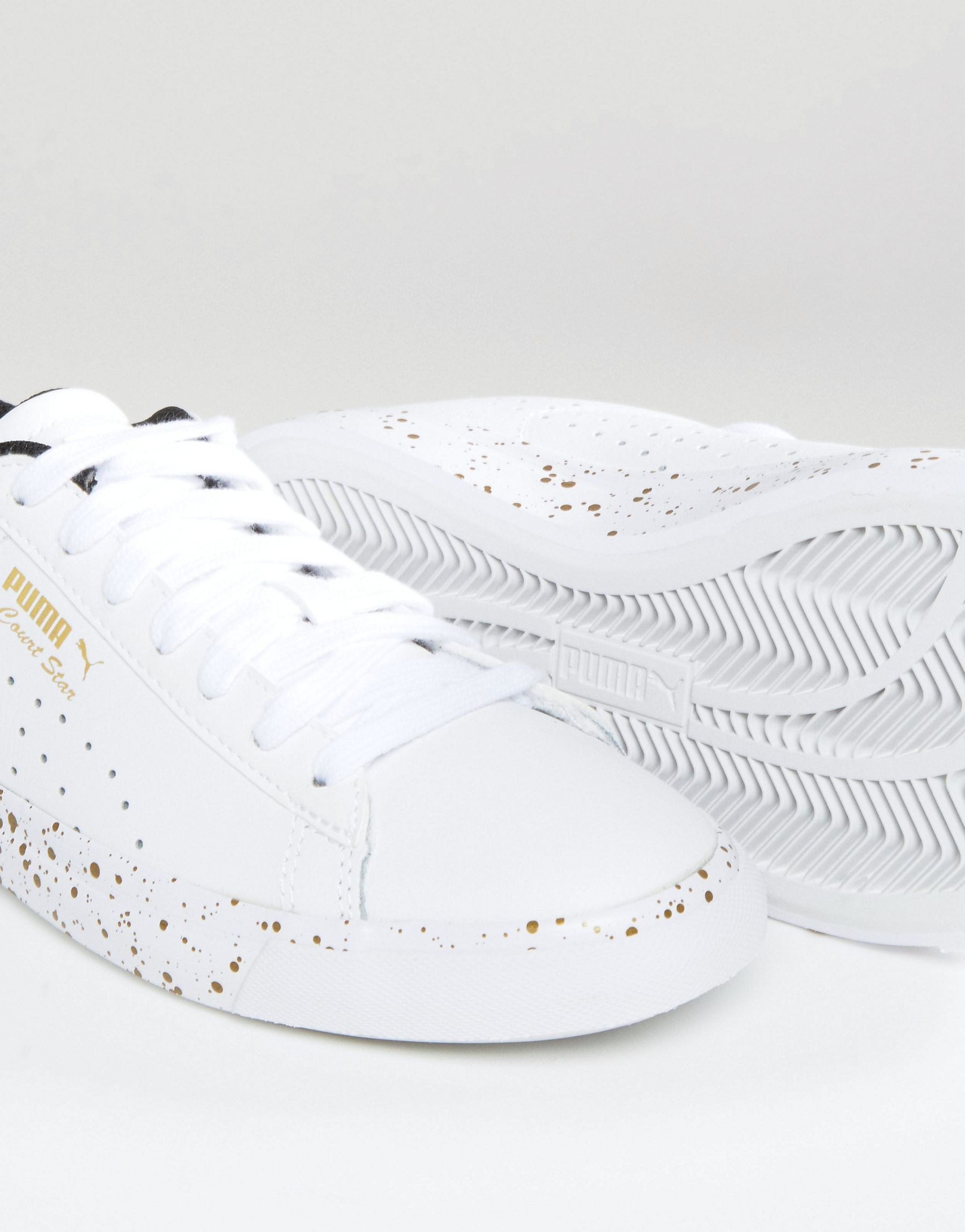 white leather puma shoes
