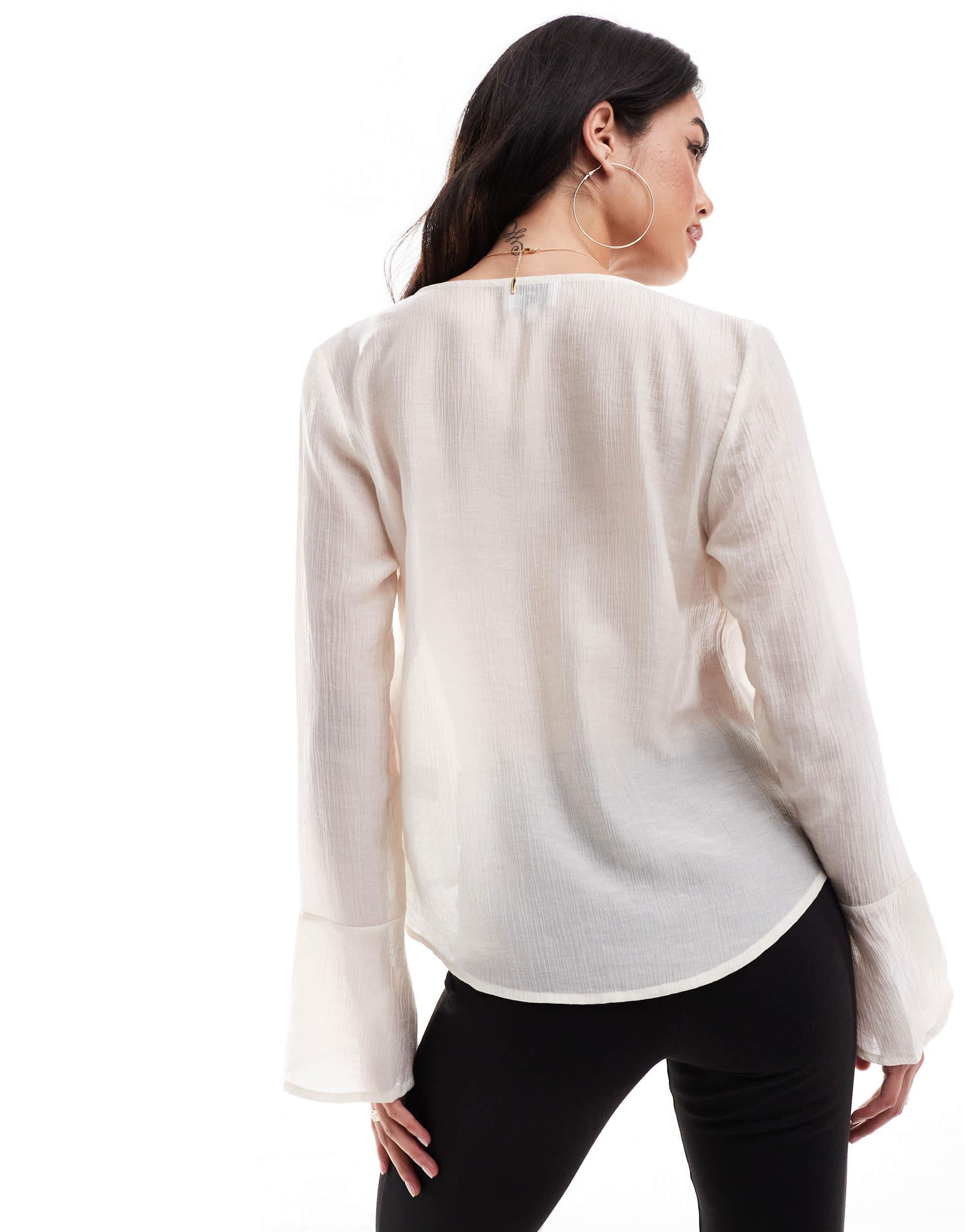 Blouse transparente a decollete plongeant et detail noue SNDY S en coloris Noir Lyst