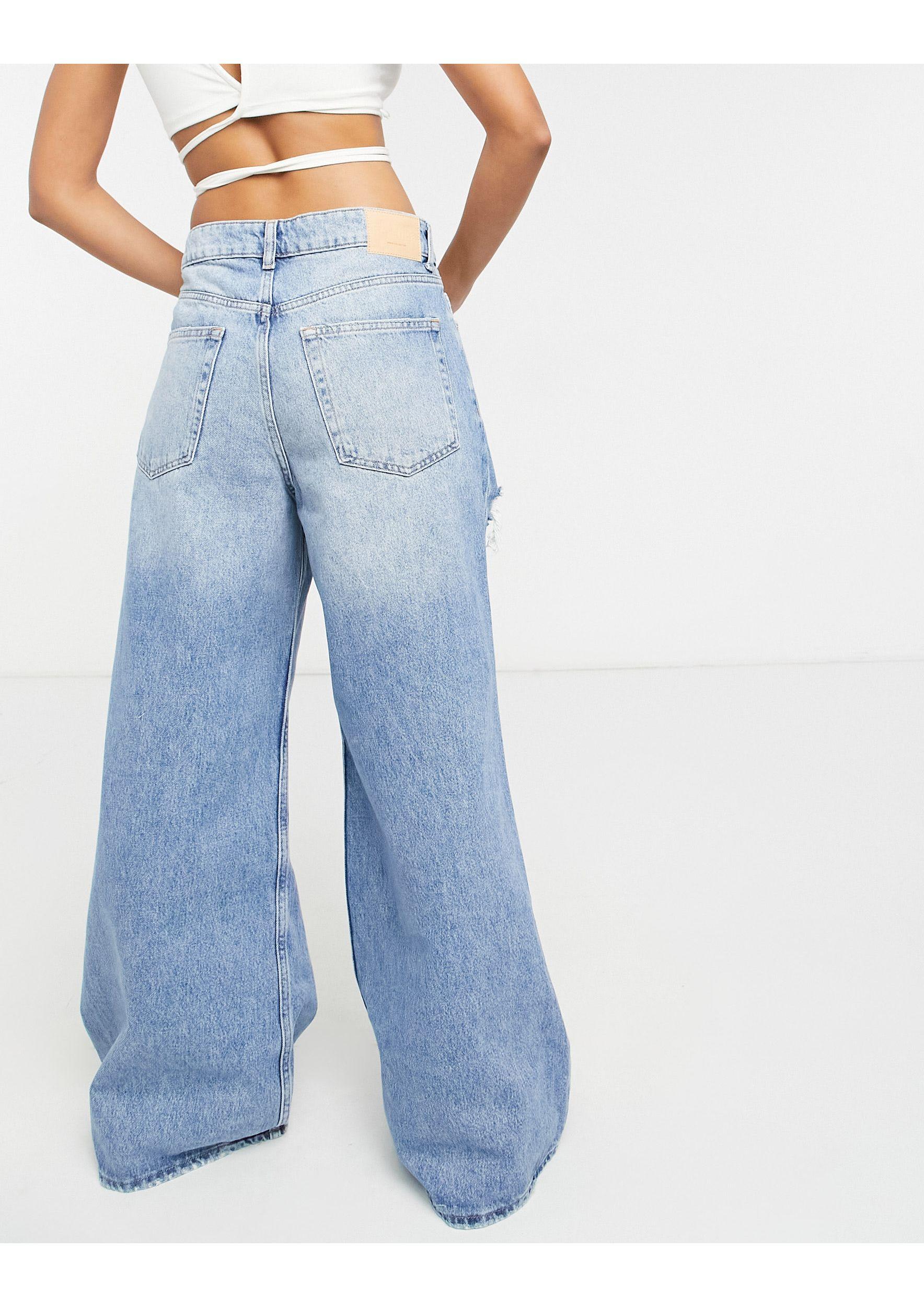 Bershka Denim baggy Jaren 90 Jeans Met Scheur Op in het Blauw | Lyst NL