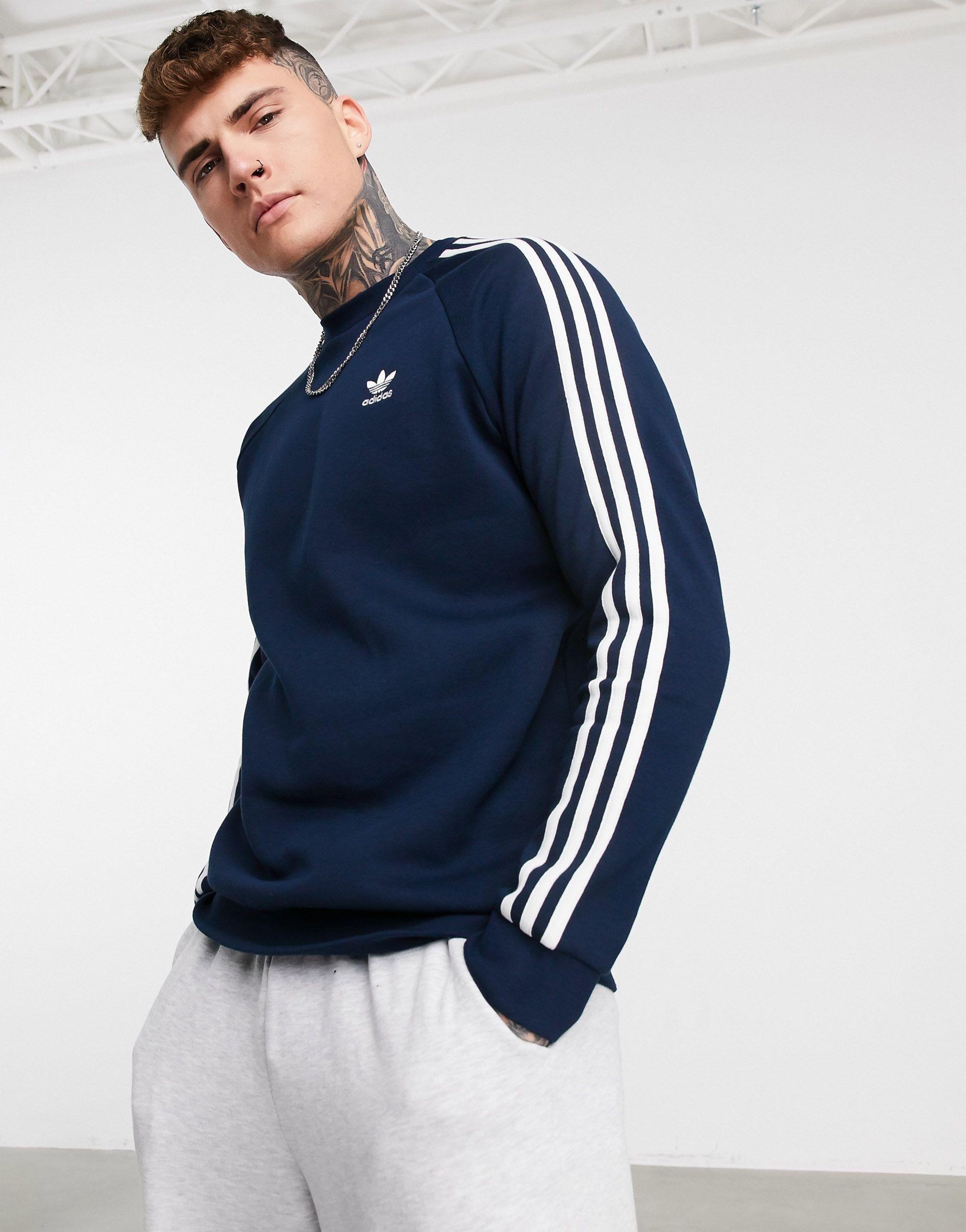 adidas originals three stripe sweatshirt in blue