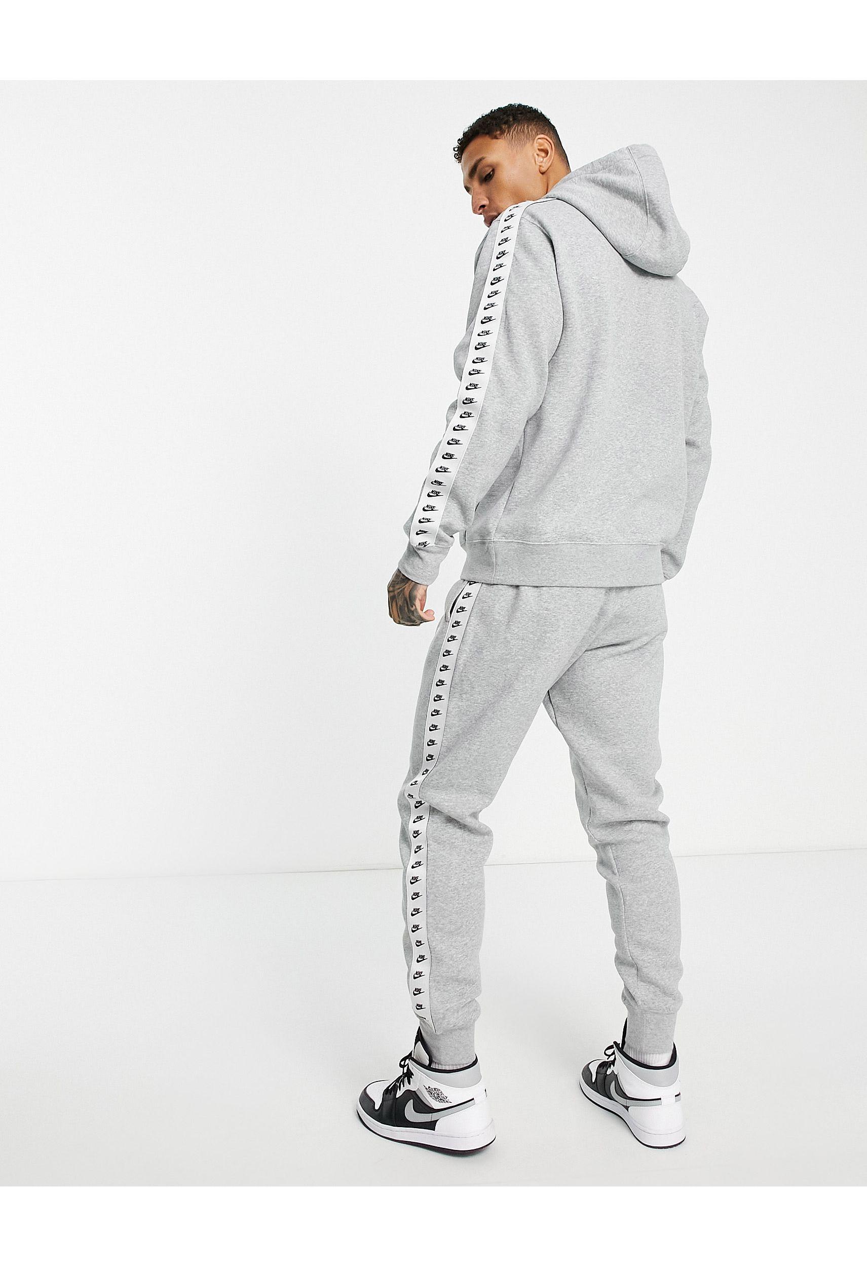 Nike Repeat Logo Taped Fleece Tracksuit Set in White for Men | Lyst UK