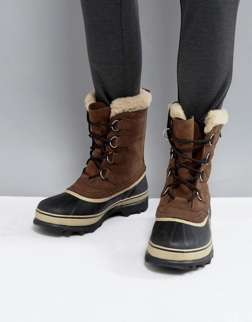 Sorel Leather Boots Caribou Waterproof Sherpa Boots in Brown - Lyst