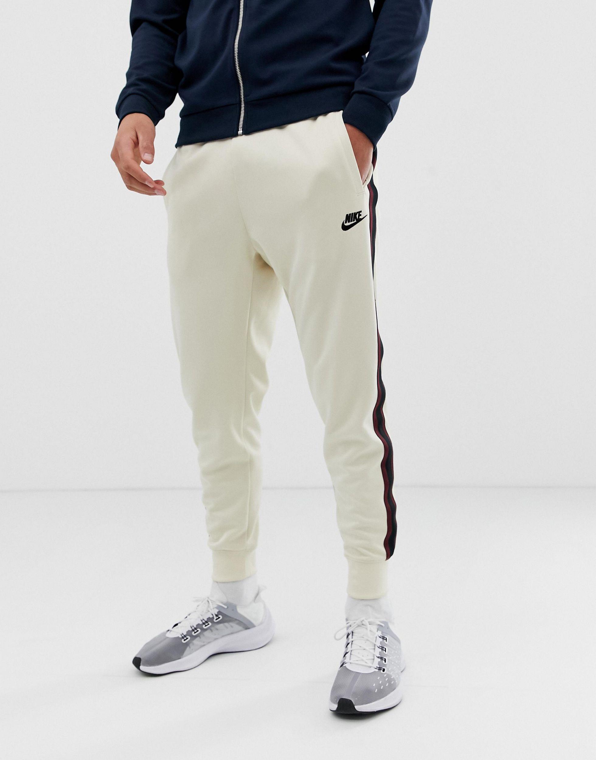 nike tribute joggers red