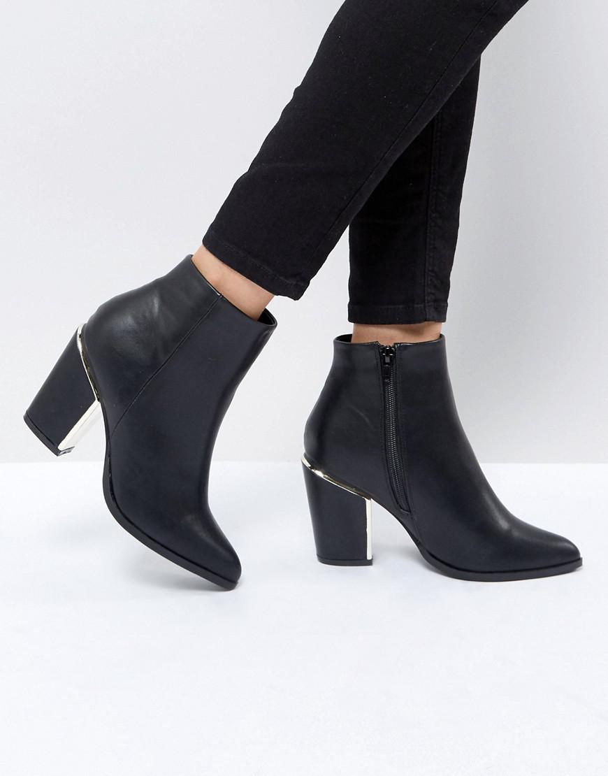 knee high boots with gold trim