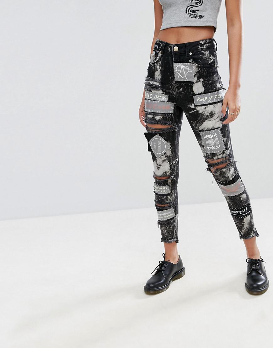 Jeans with rips and patches Clearance