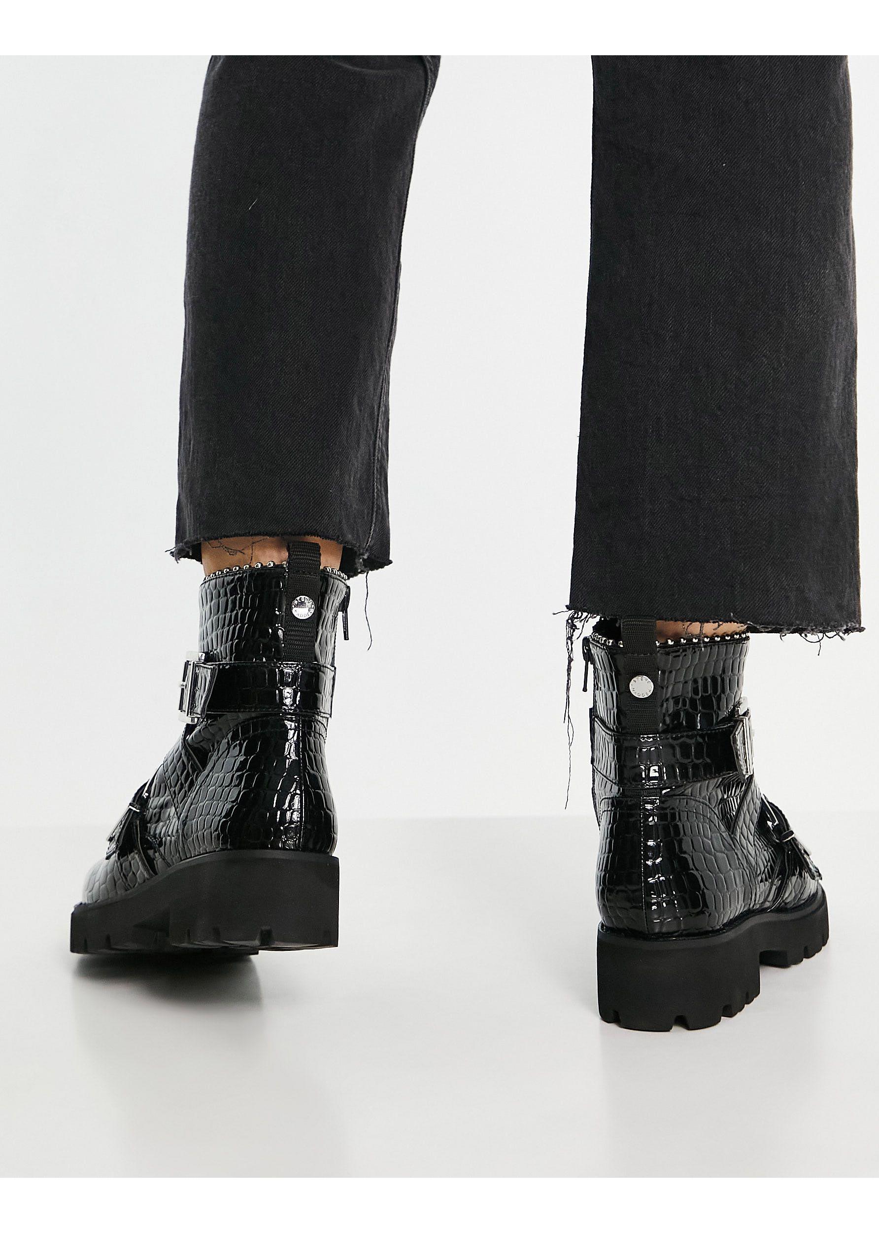 Steve Madden Hoofy Chunky Buckle Flat Boots in Black | Lyst UK