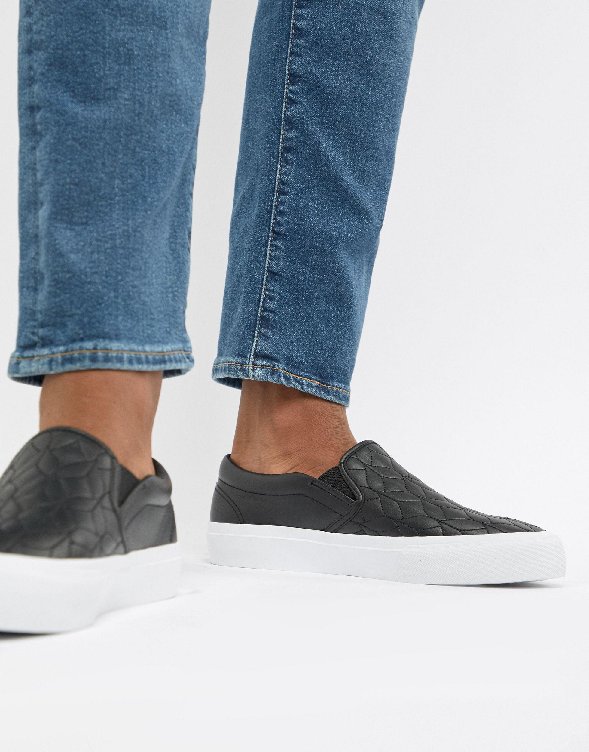 black slip on plimsolls
