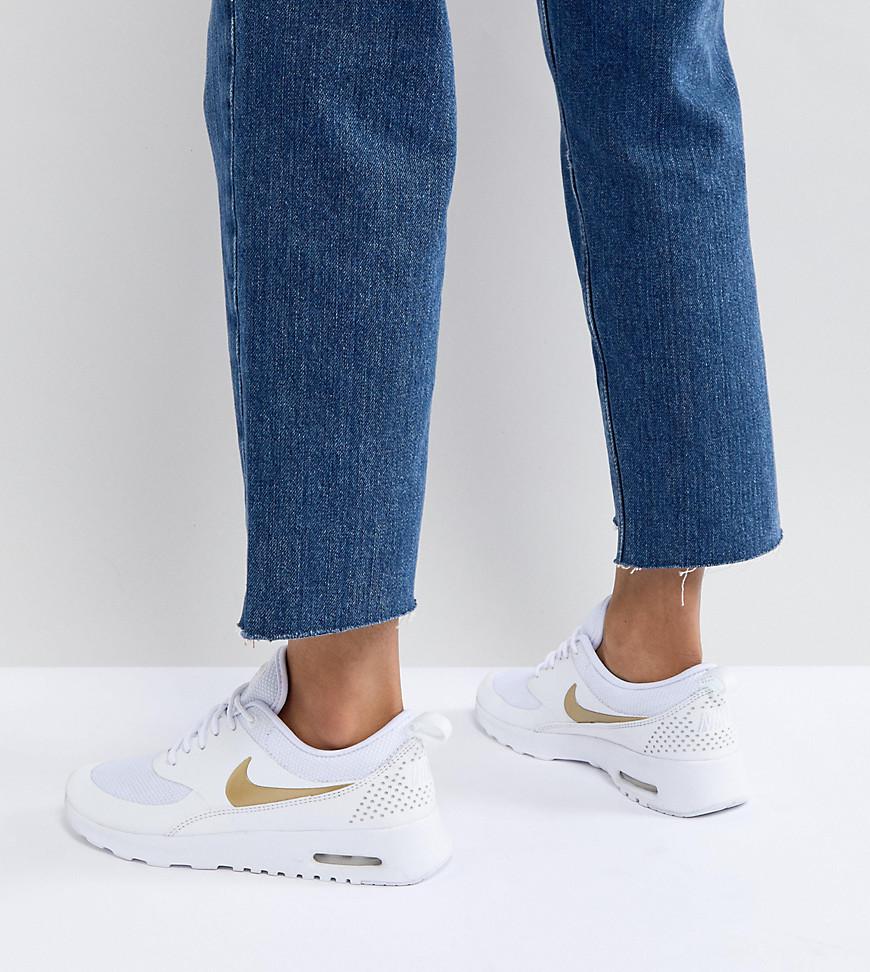white and gold air max thea