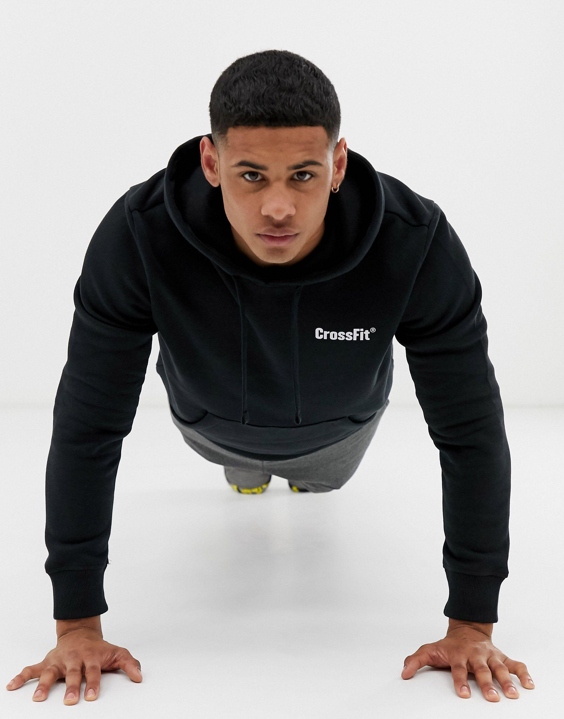 Reebok Apparel Men Reebok Identity Fleece Stacked Logo Pullover Hoodie –  Reebok Canada