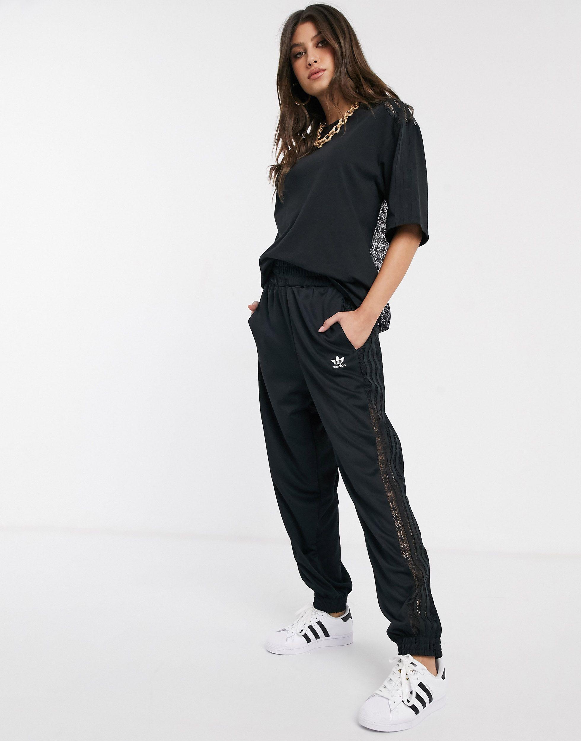 Bellista - Pantaloni sportivi neri con insertiadidas Originals in Materiale  sintetico di colore Nero | Lyst