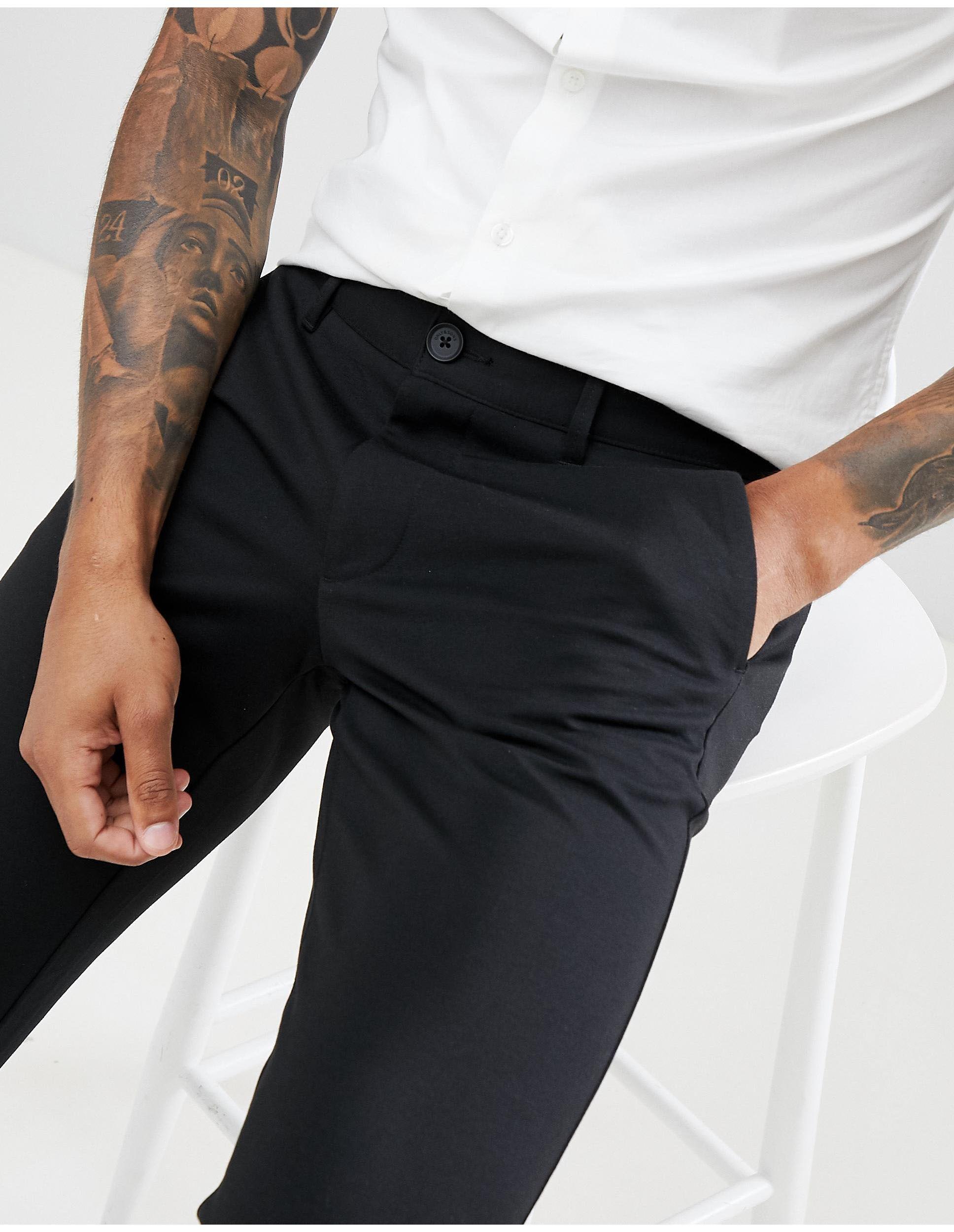 black skinny tapered trousers