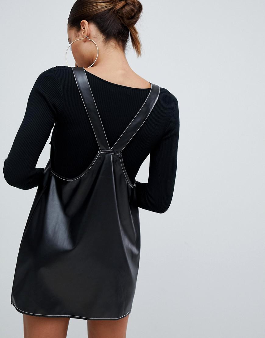 black leather look pinafore dress