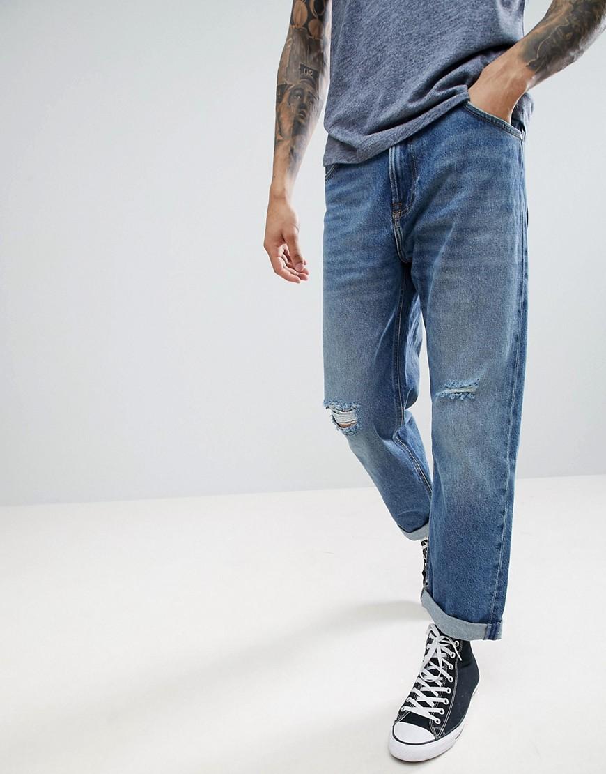 Jeans cropped larghi con strappi alle ginocchiaLee Jeans in Denim da Uomo  colore Blu | Lyst