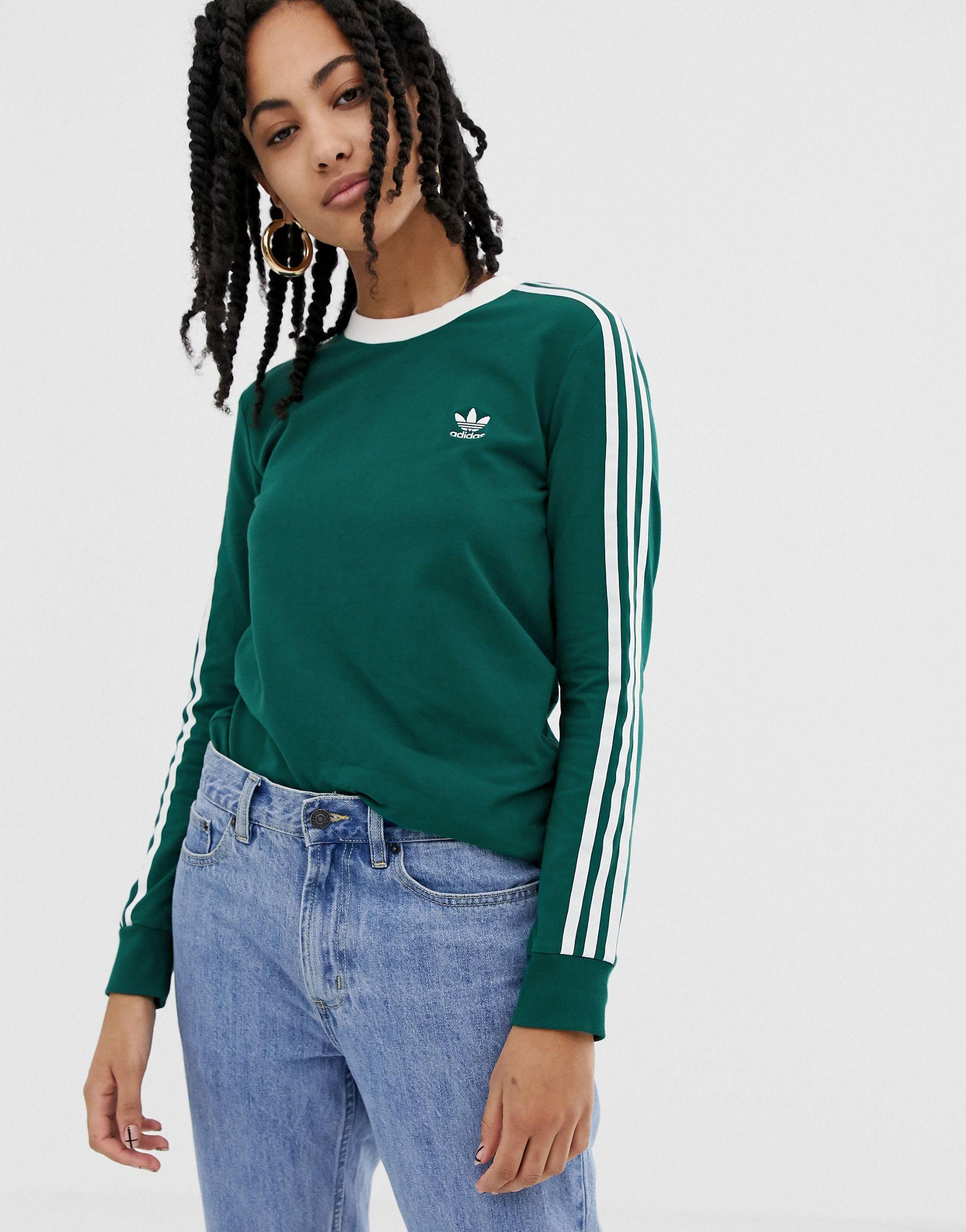 adidas Originals – adicolor – es langärmliges Shirt mit drei Streifen in  Grün | Lyst DE