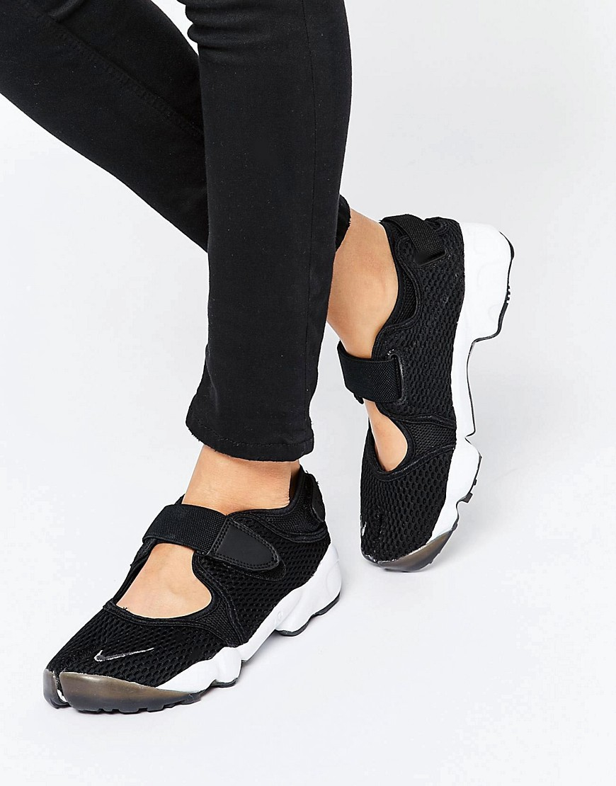 nike strap trainers womens