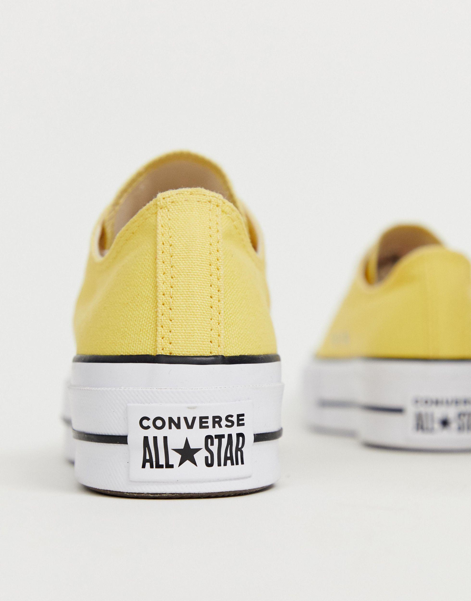 Converse Canvas Chuck Taylor All Star - Lage Gele Sneakers Met Plateauzool  in het Geel - Lyst