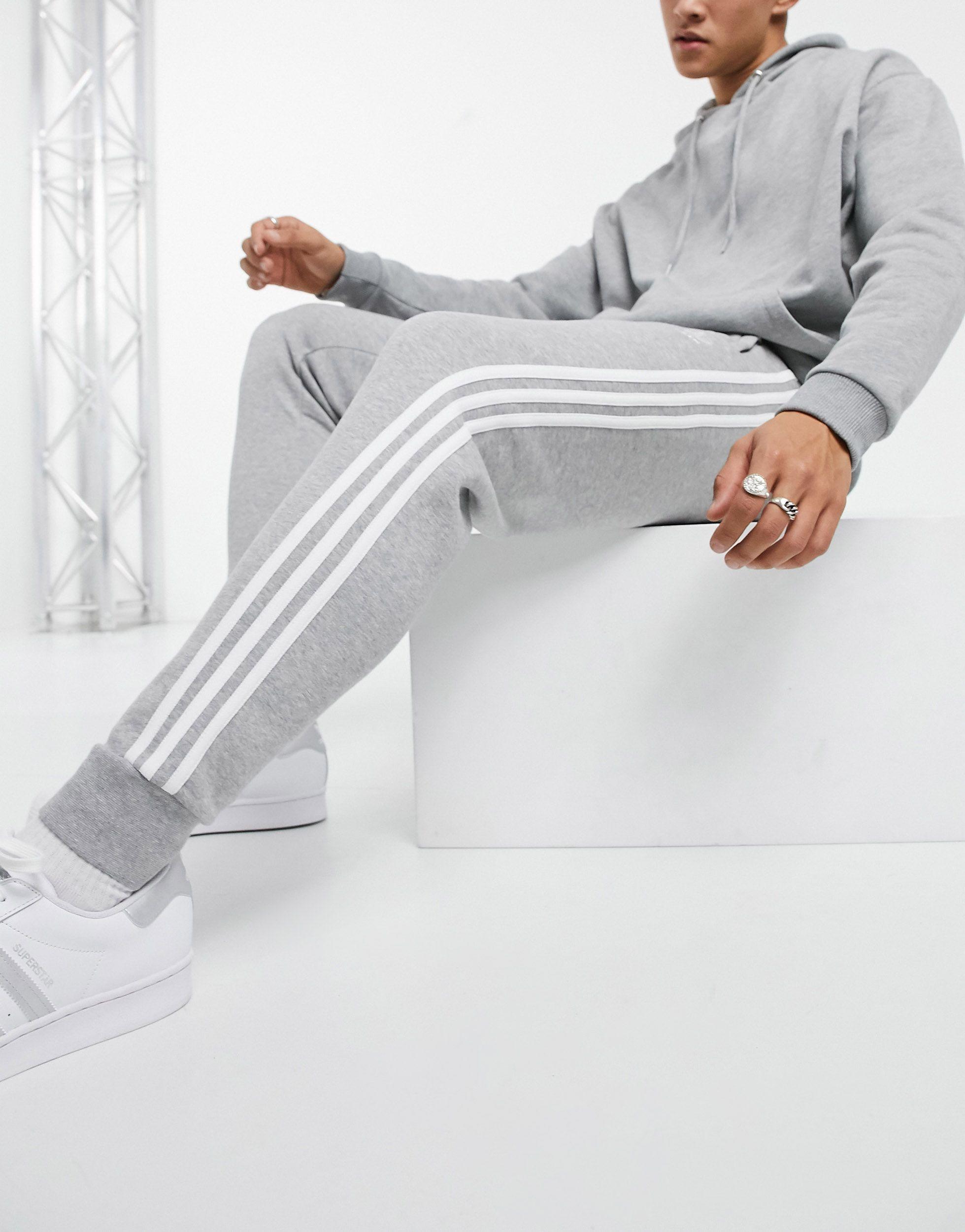 light grey trackies