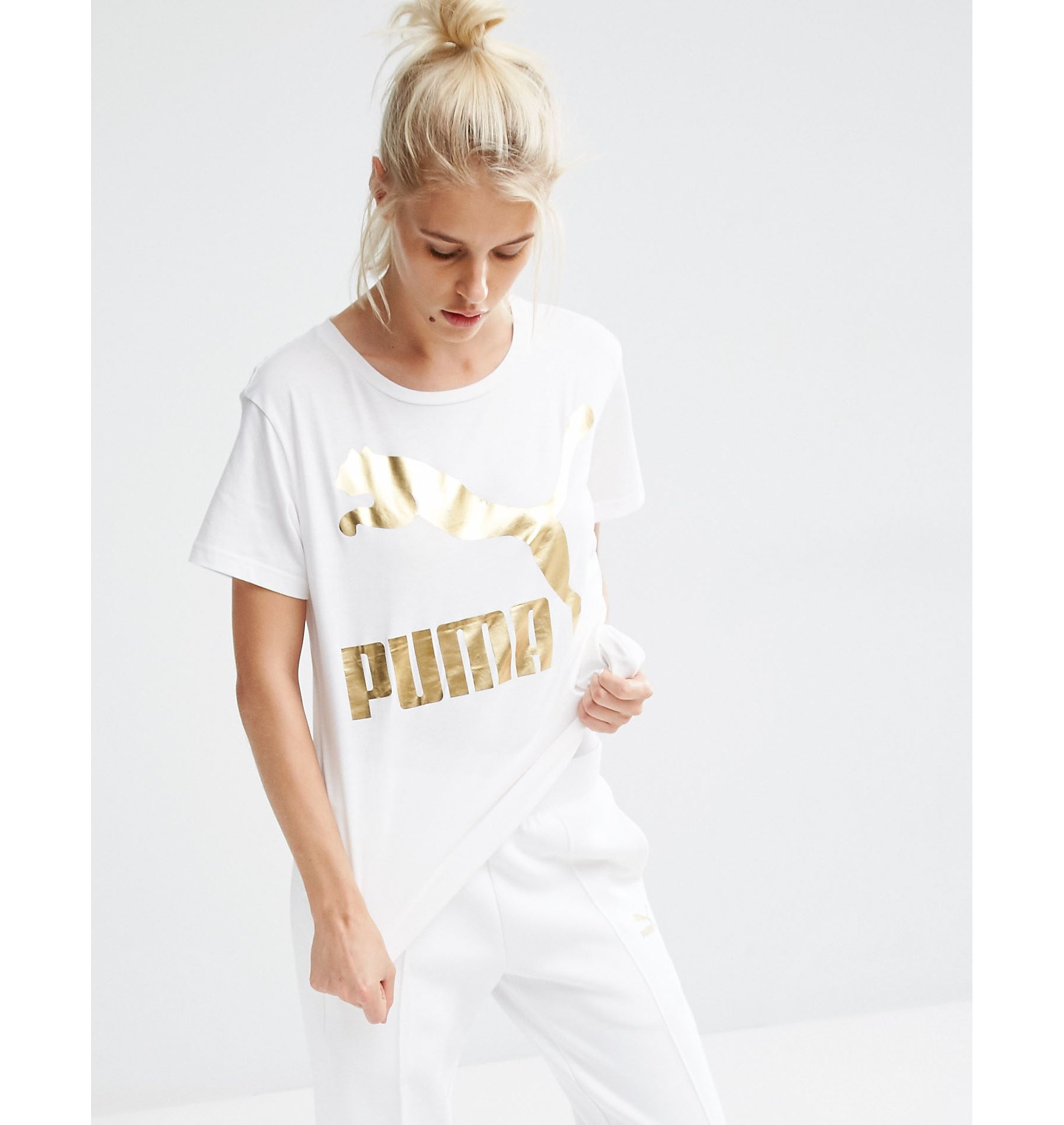 white and gold puma t shirt
