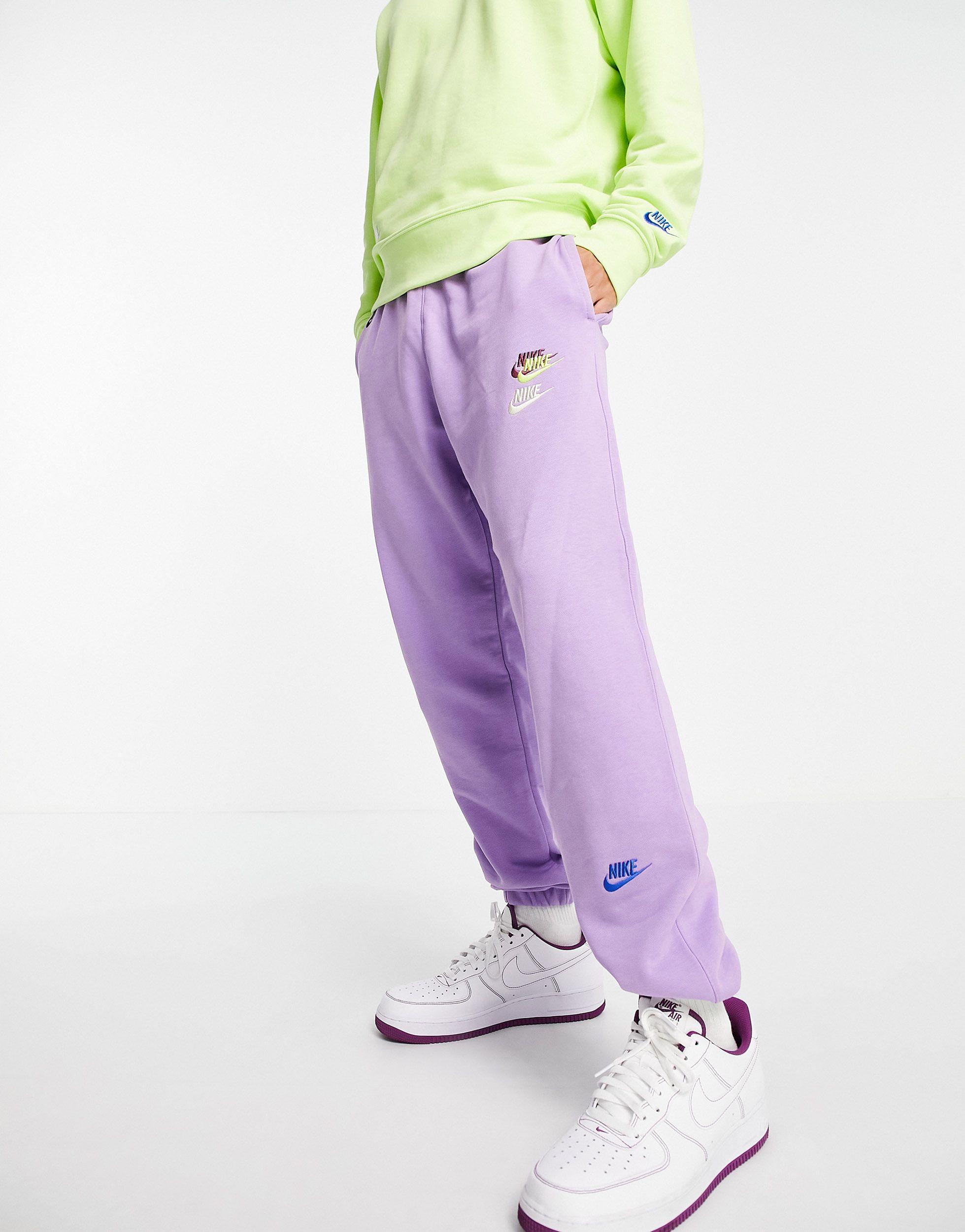 Nike Essential Fleece+ Multi Logo Casual Fit Cuffed joggers in Purple for  Men | Lyst UK