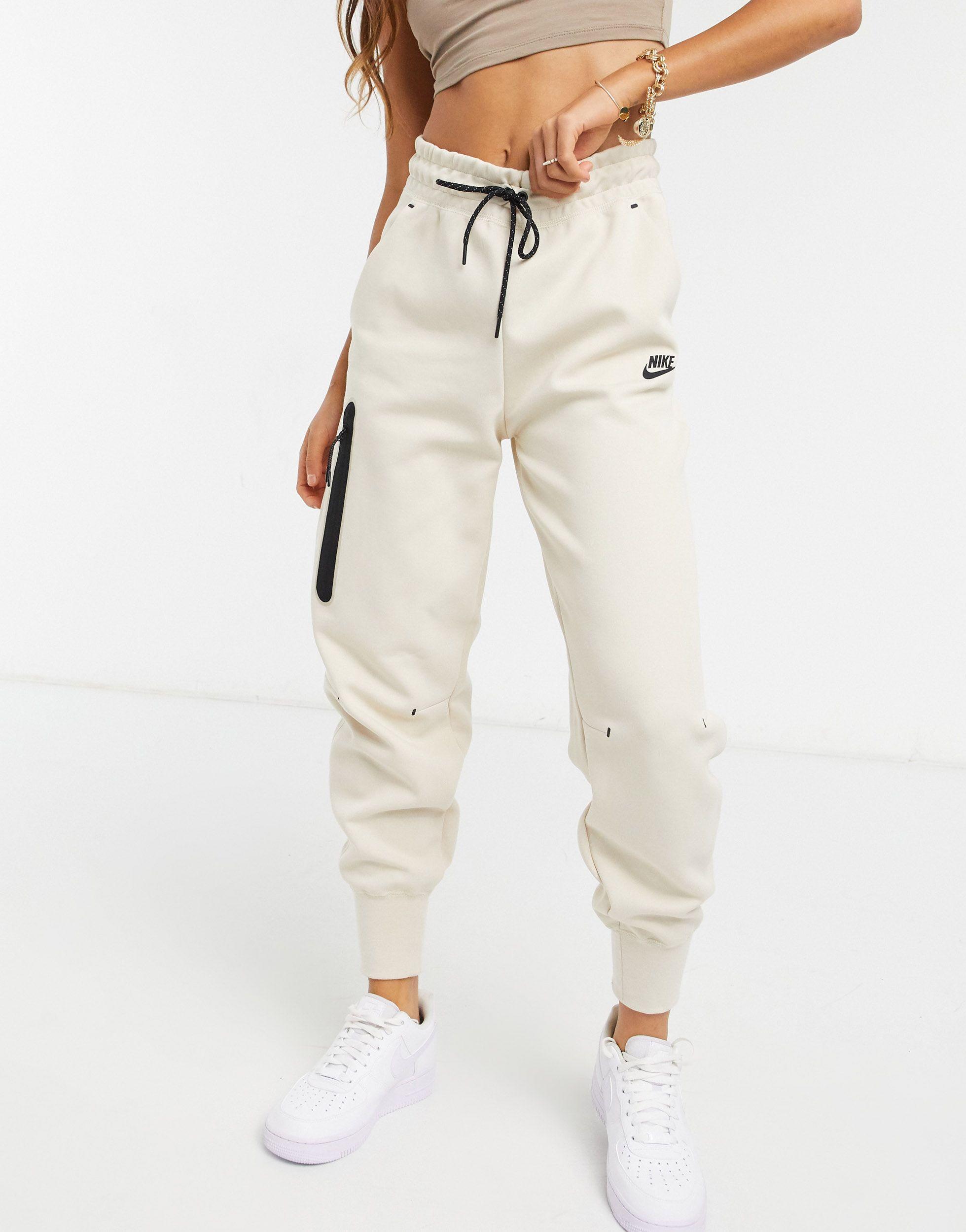 nike oatmeal tracksuit bottoms